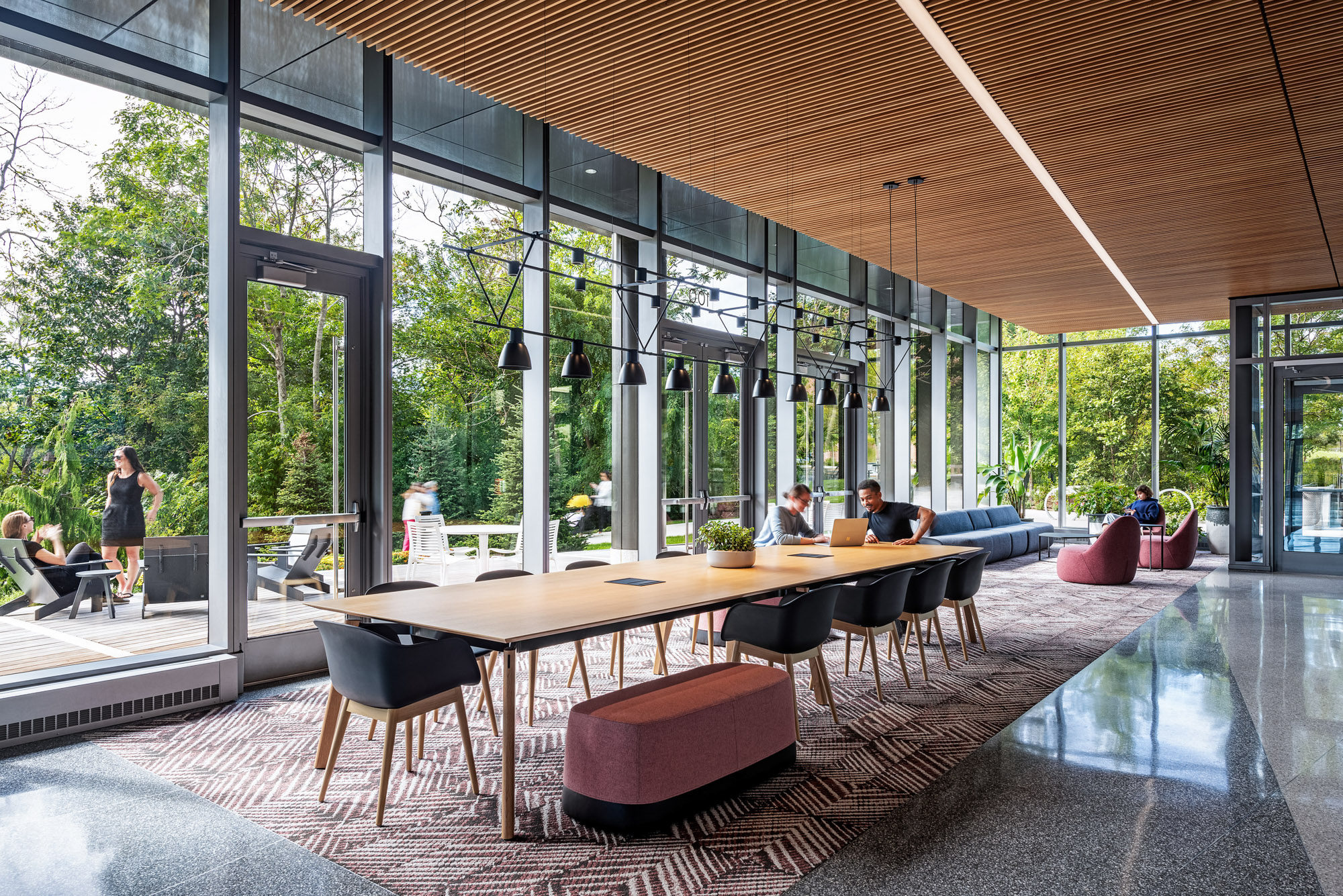 A table gathering space in the lobby of 100 Forge