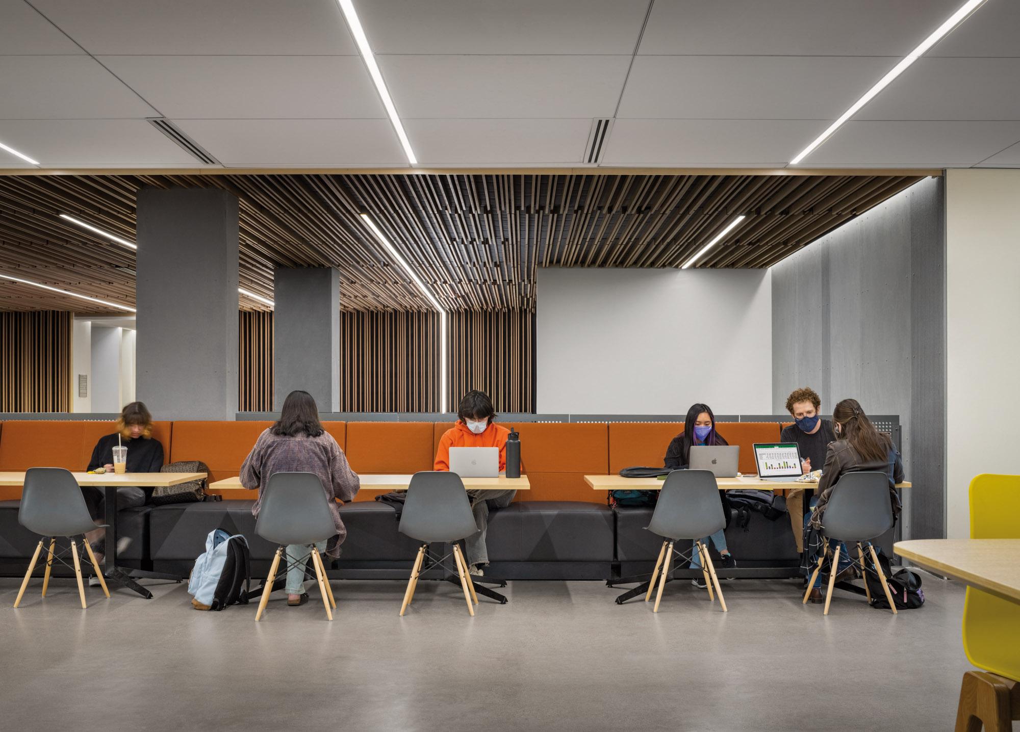 Durham Hall cafe seating offers public collaboration and learning space, facing north toward building...