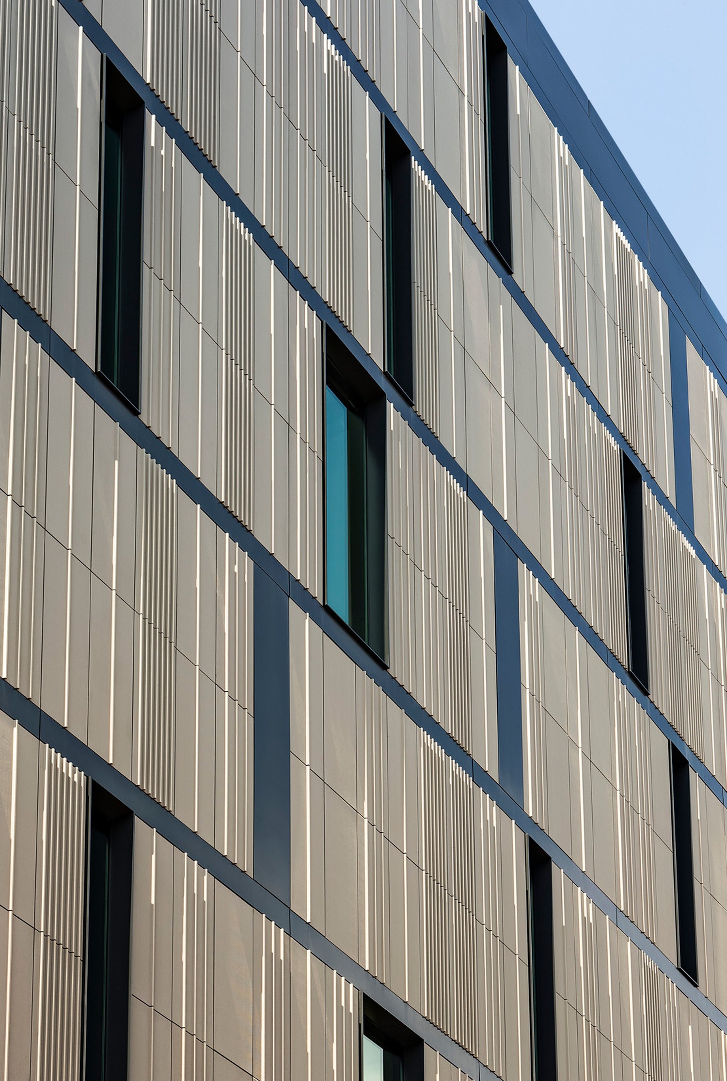 The building contains many sustainable features including a green roof, high-performance ultra-clear...