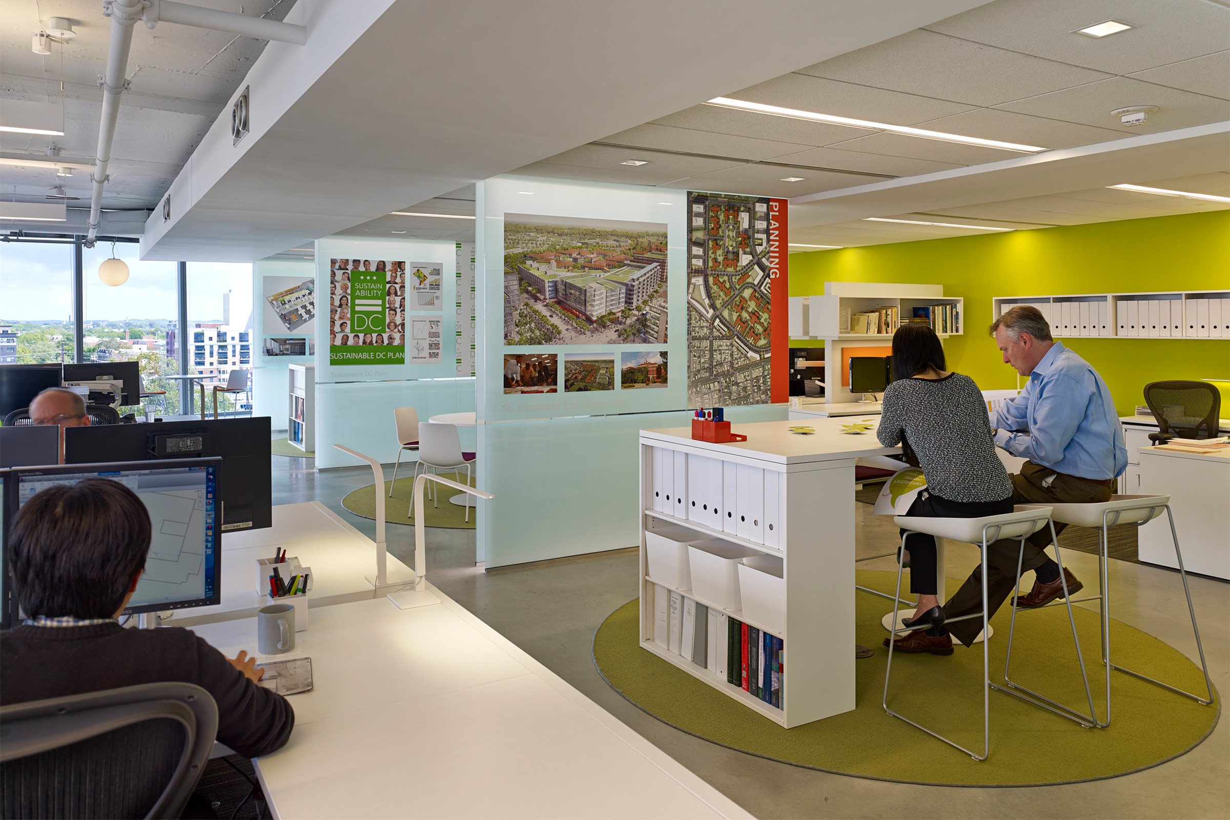 Interior of the Ayers Saint Gross DC office, view towards glass-partitioned collaboration areas...