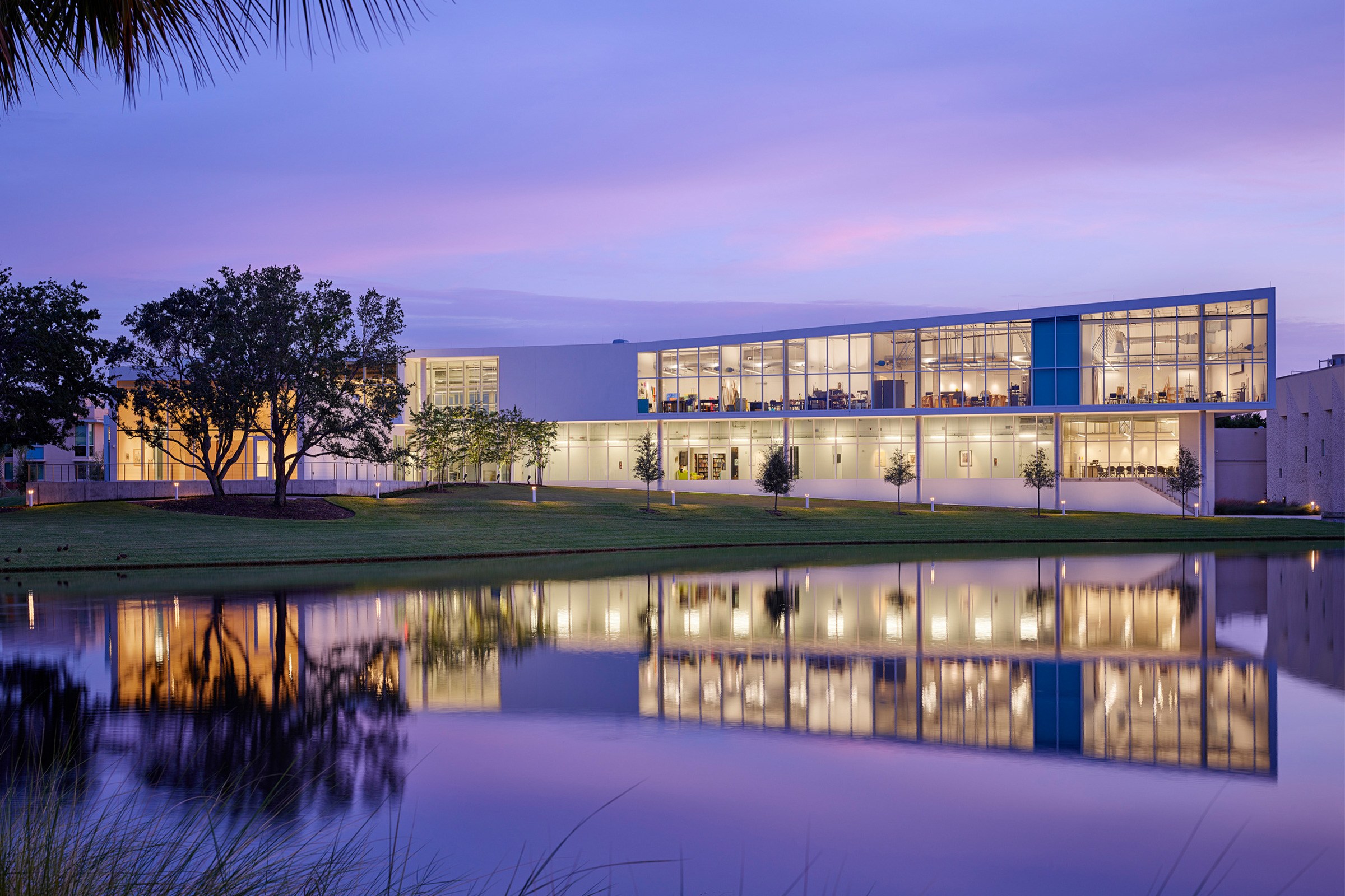 Dusk elevation image of the Helmar and Enole Nielsen Center for Visual Arts at Eckerd College with...
