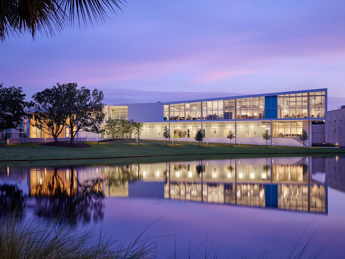 Dusk elevation image of the Helmar and Enole Nielsen Center for Visual Arts at Eckerd College with...