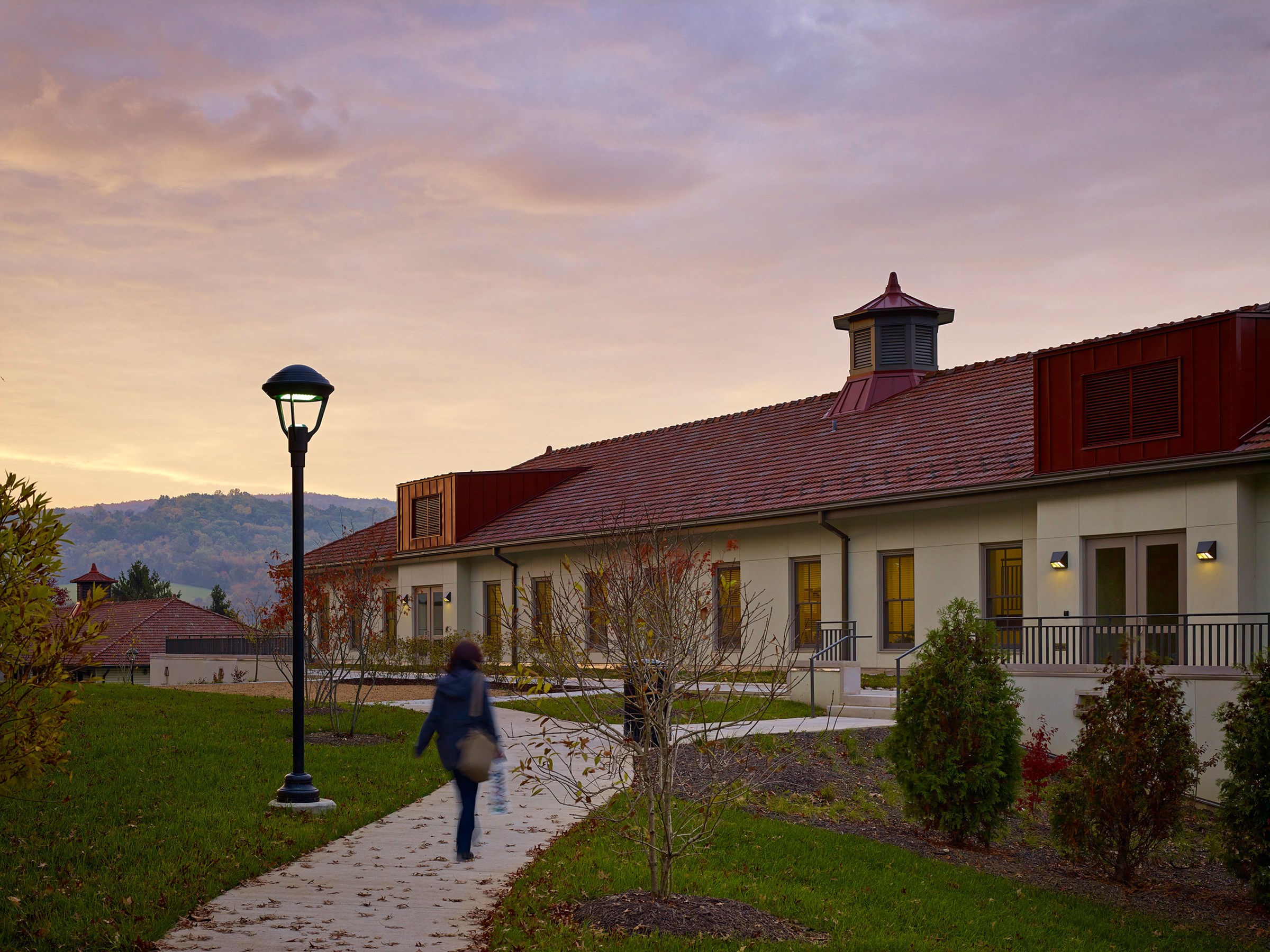 Building entrance at dusk at the Education and Training Center at the Smithsonian Conservation...