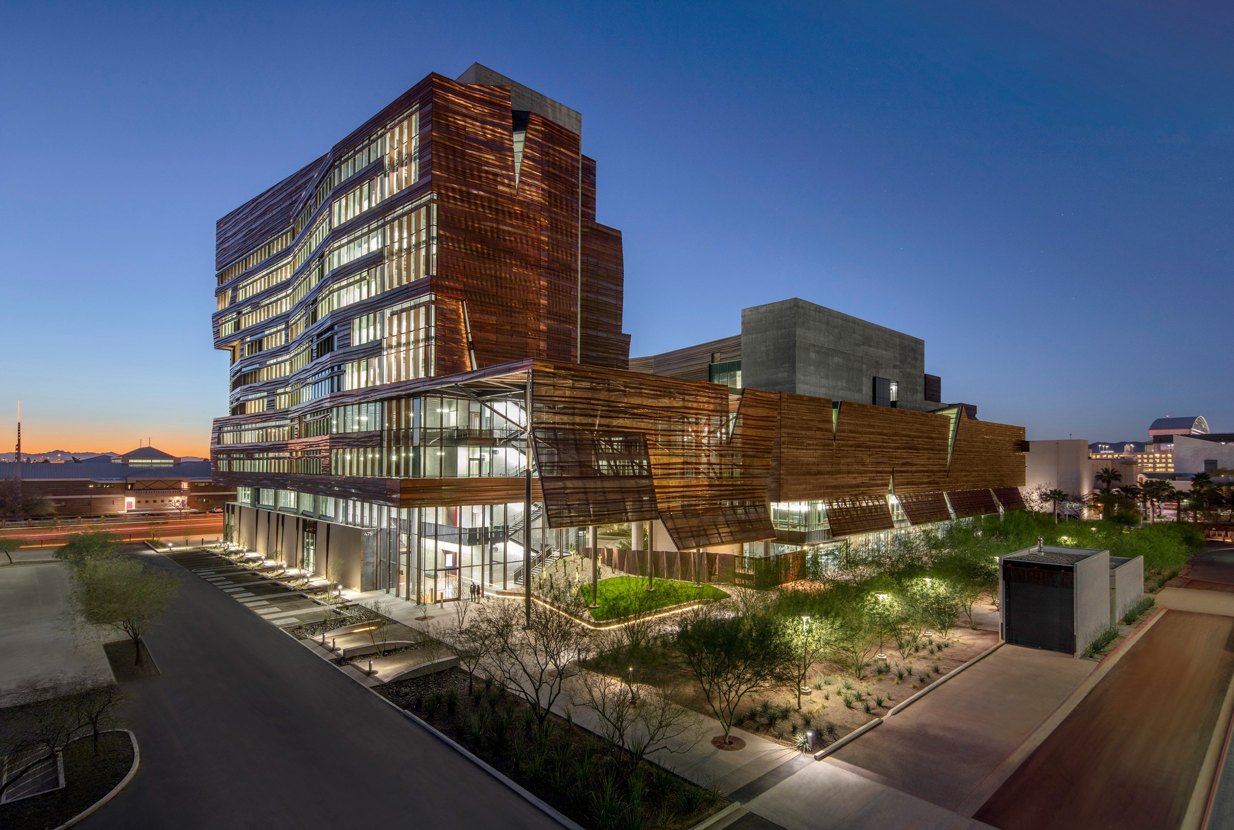 Exterior dusk corner view of University of Arizona Biomedical Sciences Partnership Building