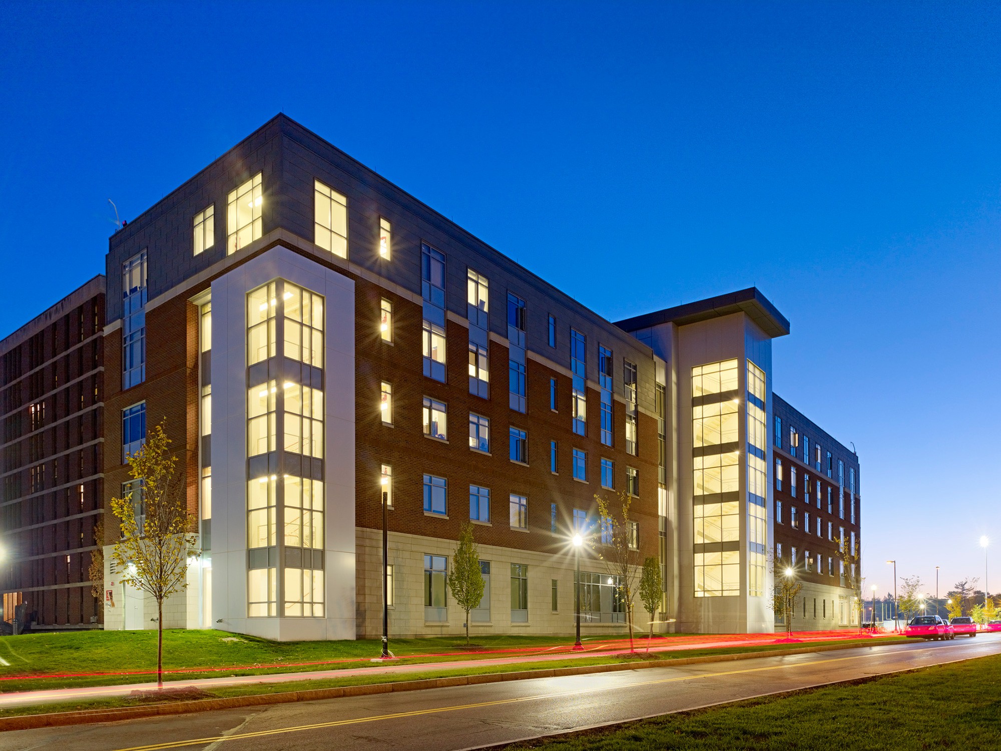 Exterior view of O’Brien Hall at University of Rochester from the street at dusk