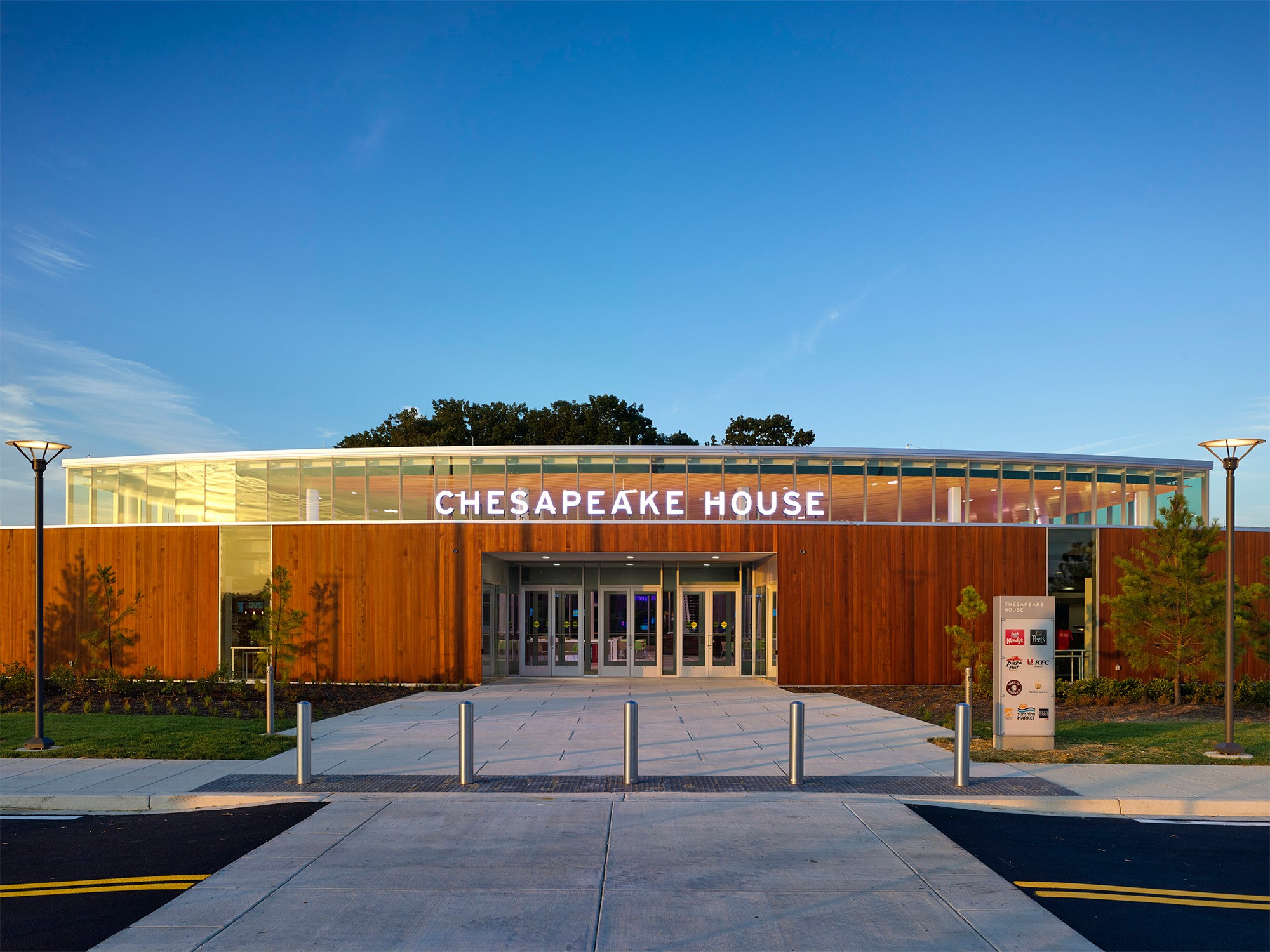 Exterior signage at travel plaza during the evening