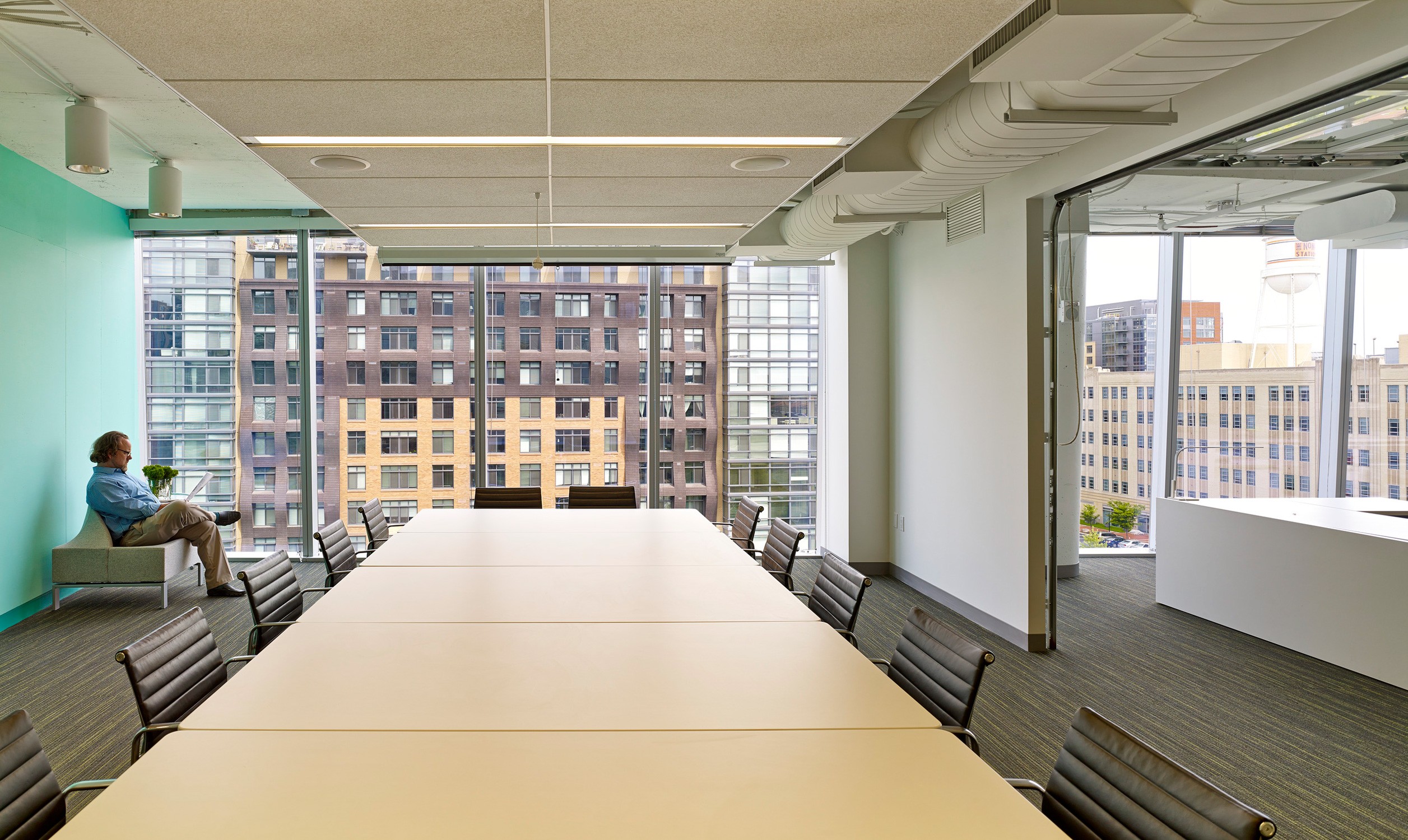 Ayers Saint Gross DC office large conference room with garage door opening to the open work area