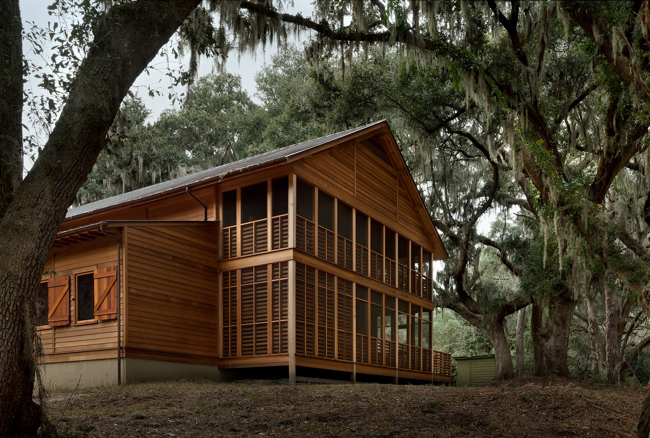 View of screened porch façade from south at Stono Barn at College of Charleston