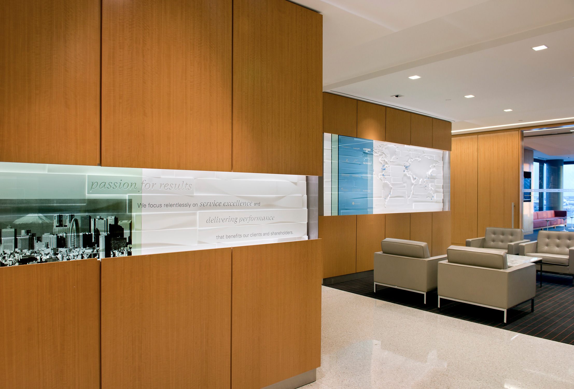Lobby detail showing panel and world map at corporate headquarters of confidential client