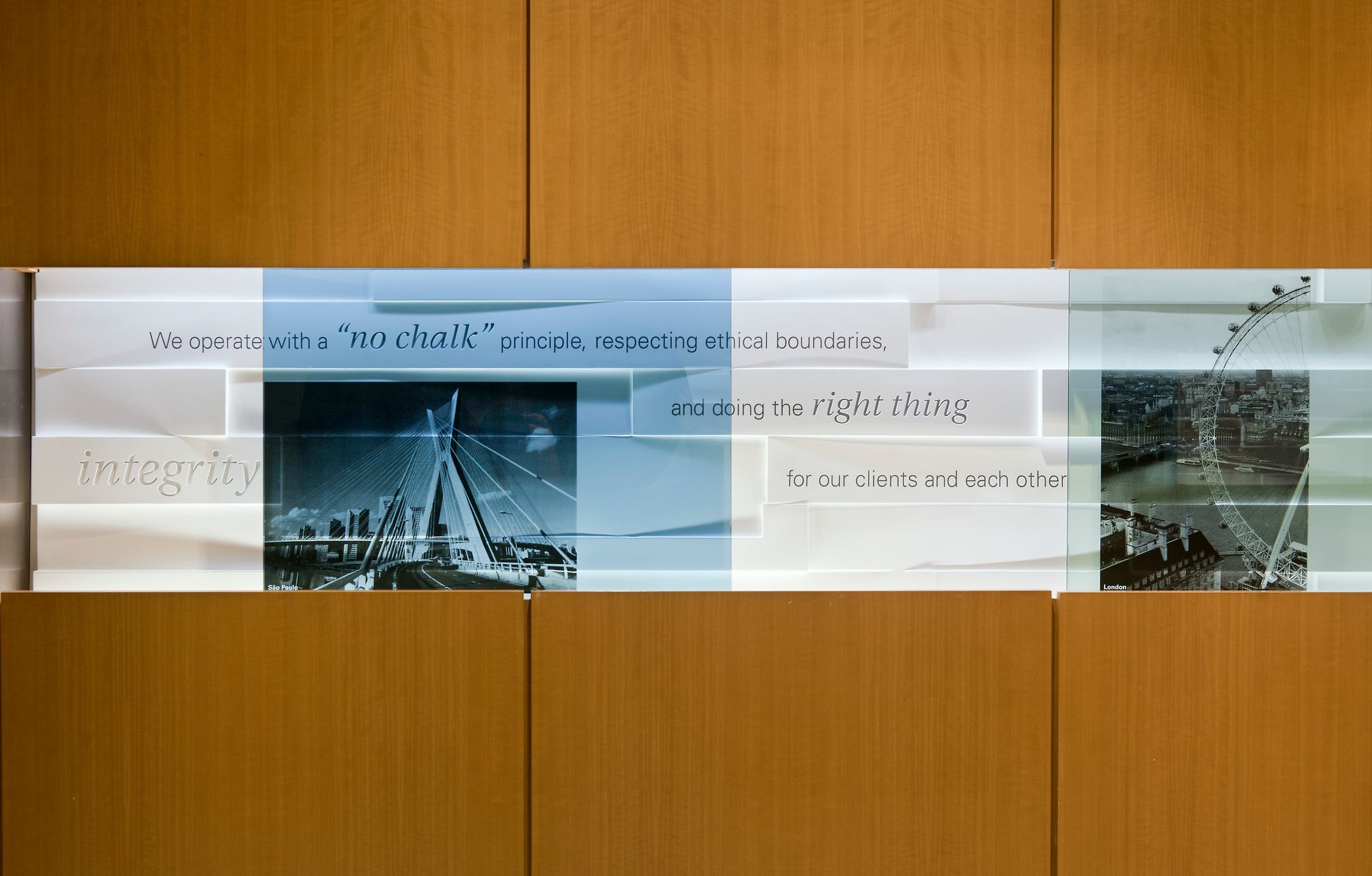 Lasercut panel detail with colored glass at corporate headquarters of confidential client