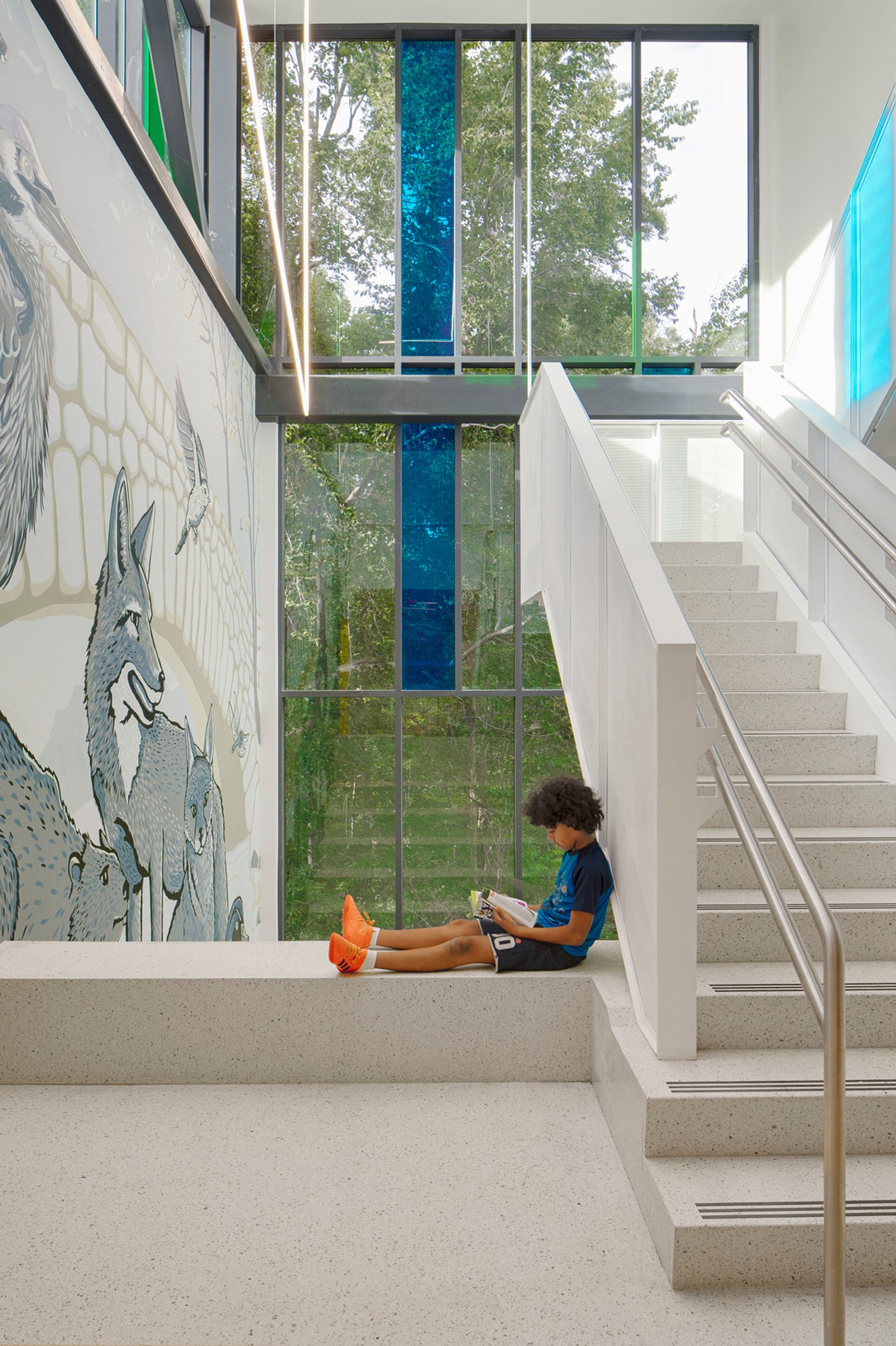 Stair detail with views to Rock Creek Park at Bancroft Elementary School
