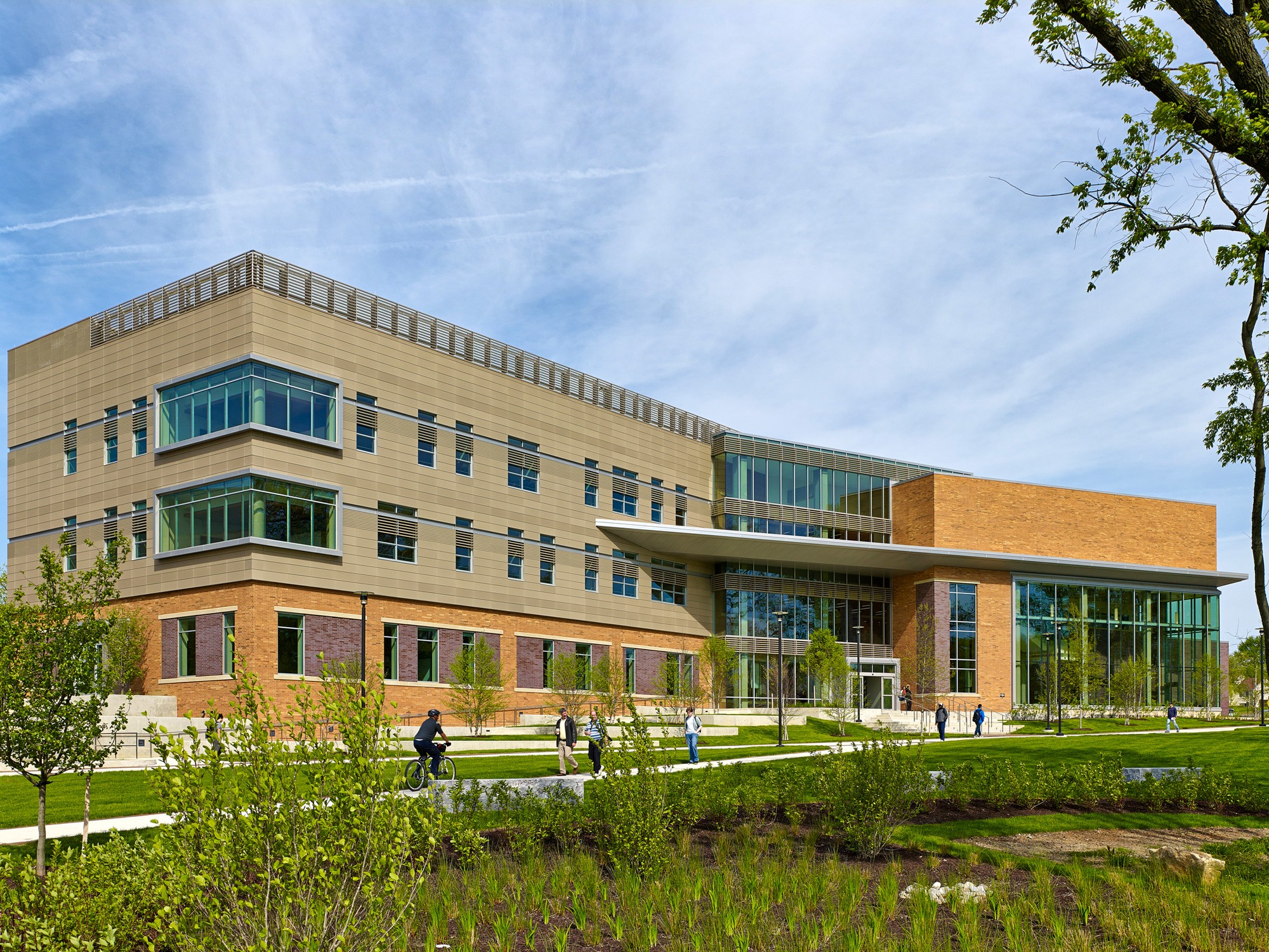 HCC Health Sciences building exterior with adjacent site landscaping prominently featured in the...