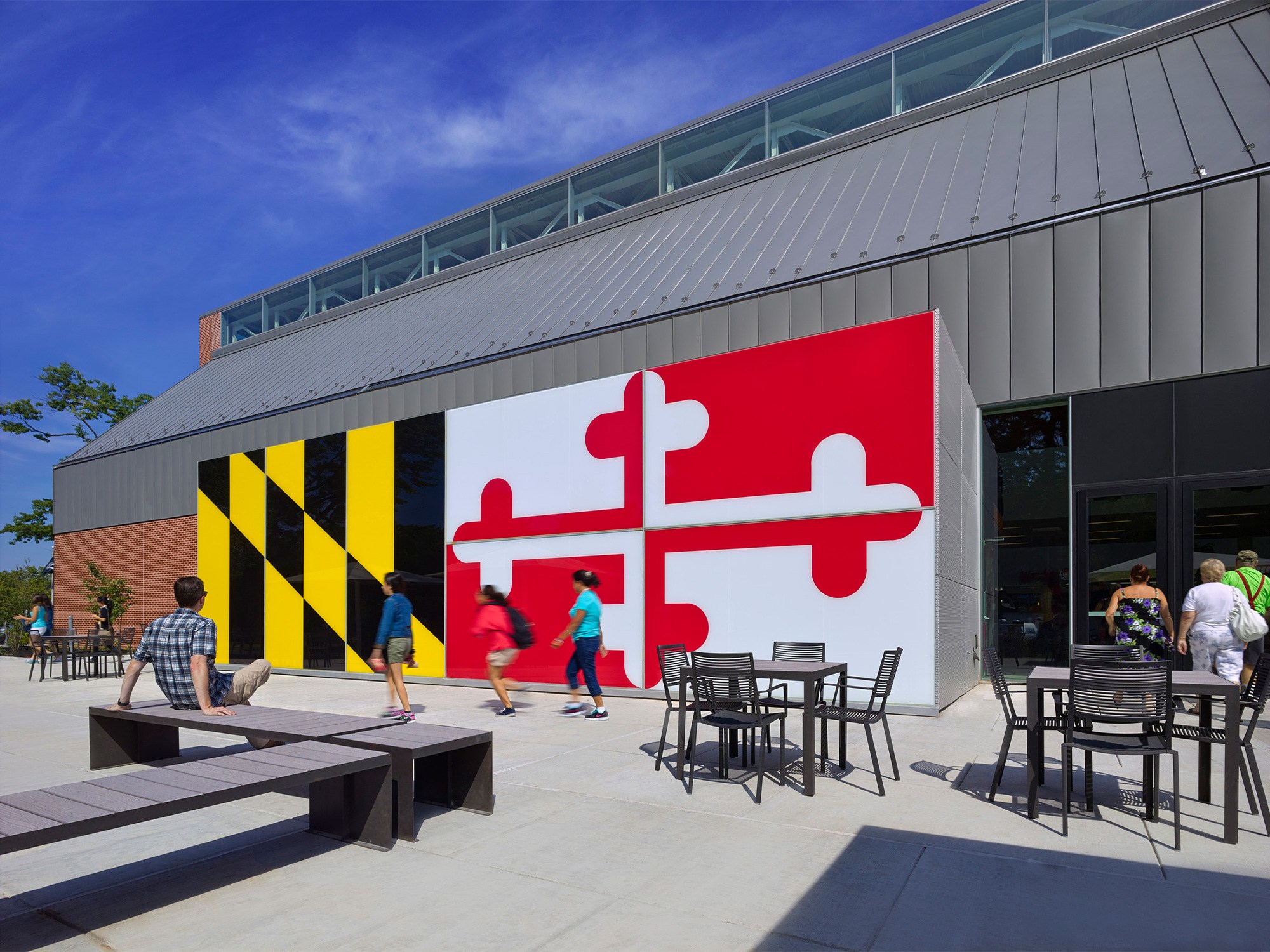 Exterior environmental graphic design for the Maryland House Travel Plaza for AREAS USA.