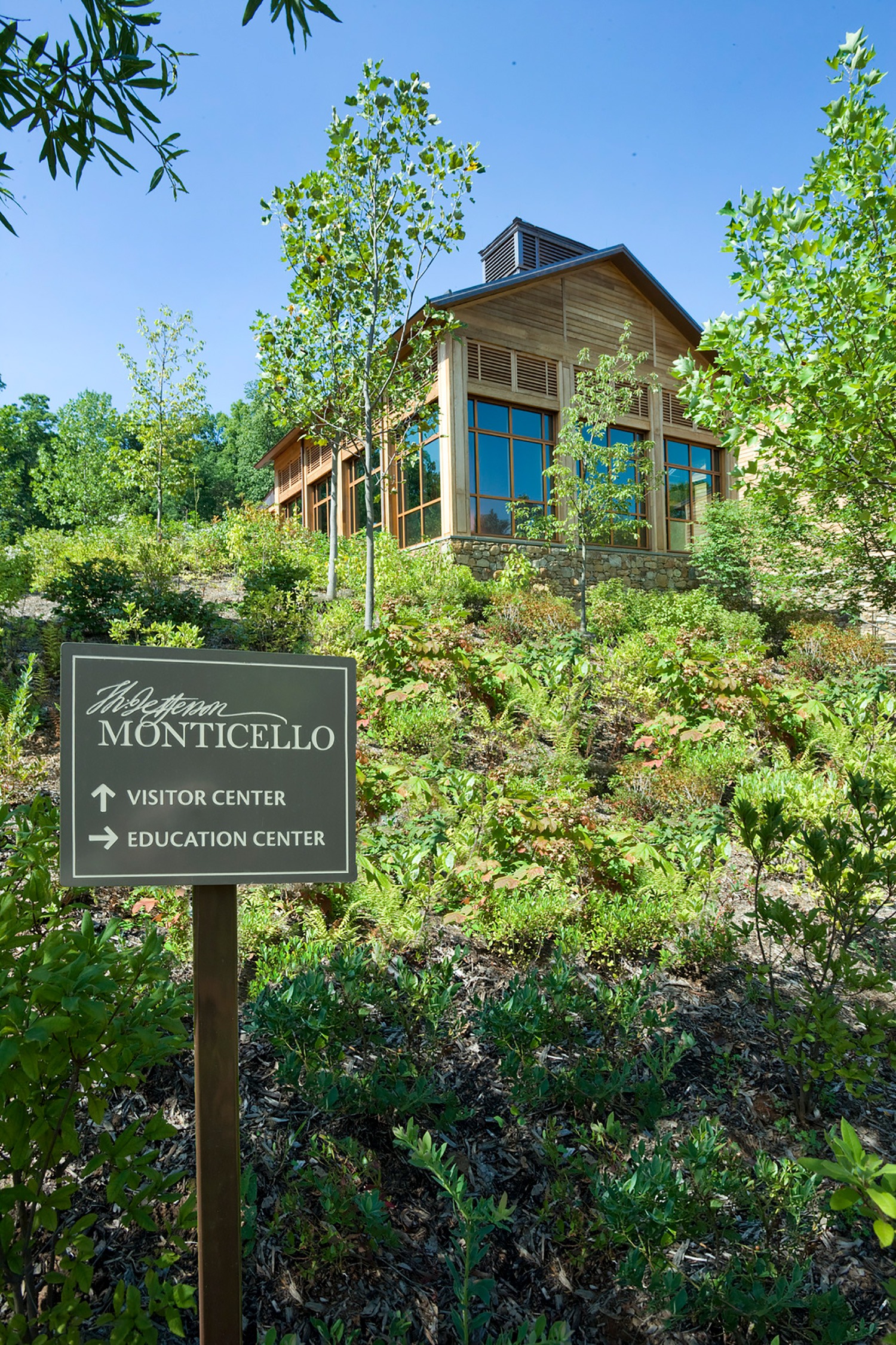 Pedestrians directional signage on campus at Thomas Jefferson’s Visitor Center and Smith Education...