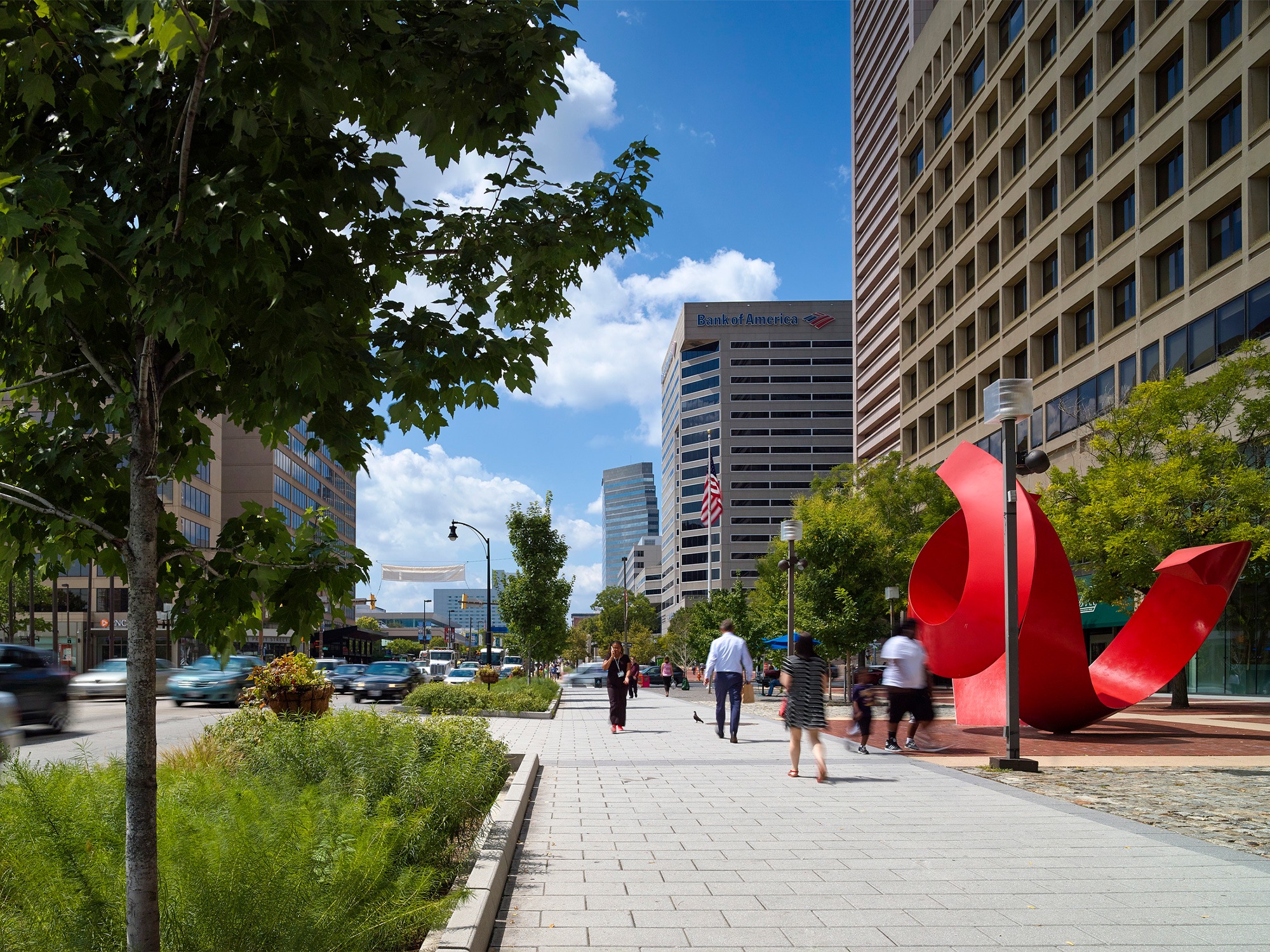 Sidewalk view looking west down redeveloped Pratt Street
