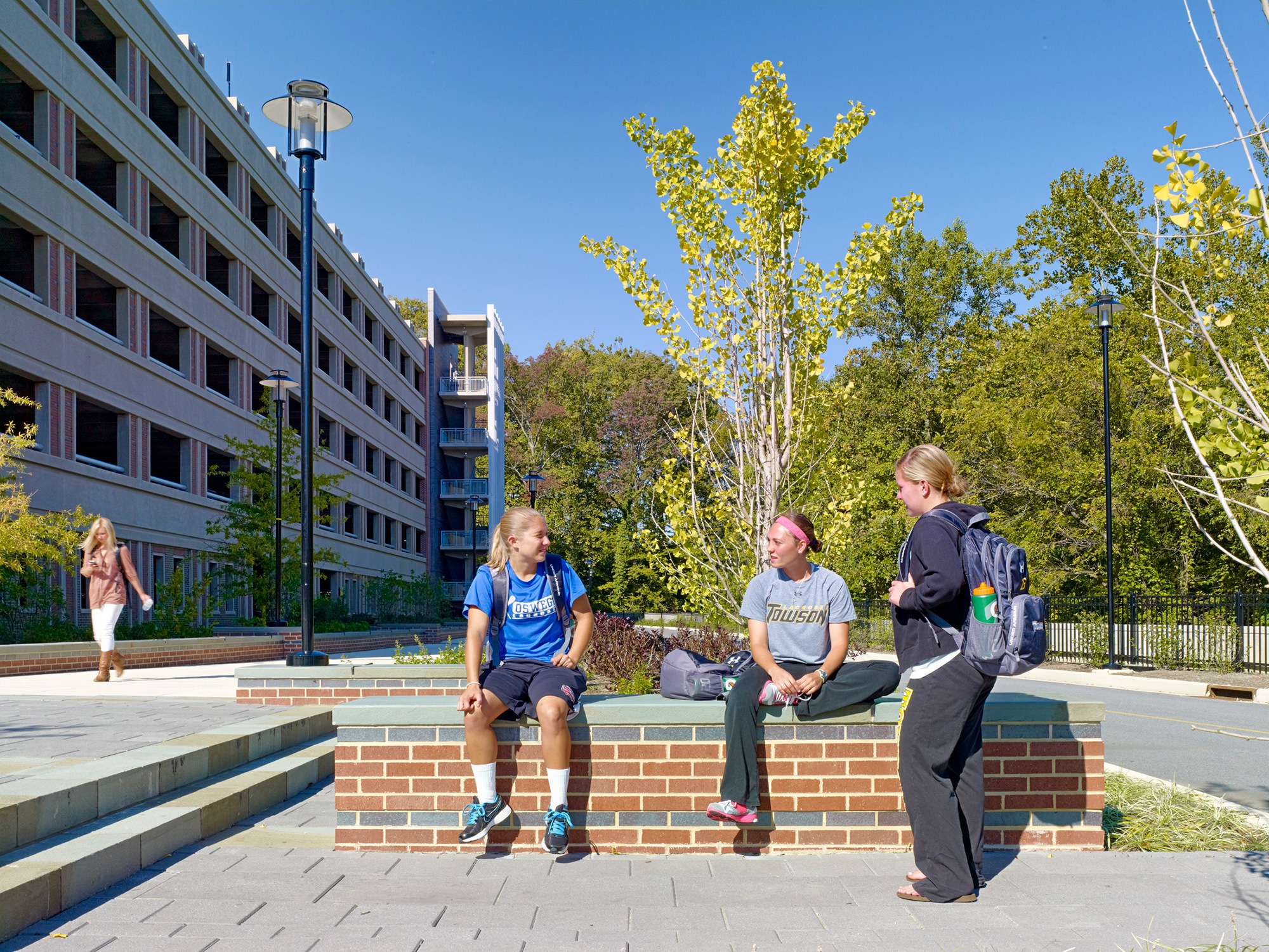Students relaxing on the tiered plaza