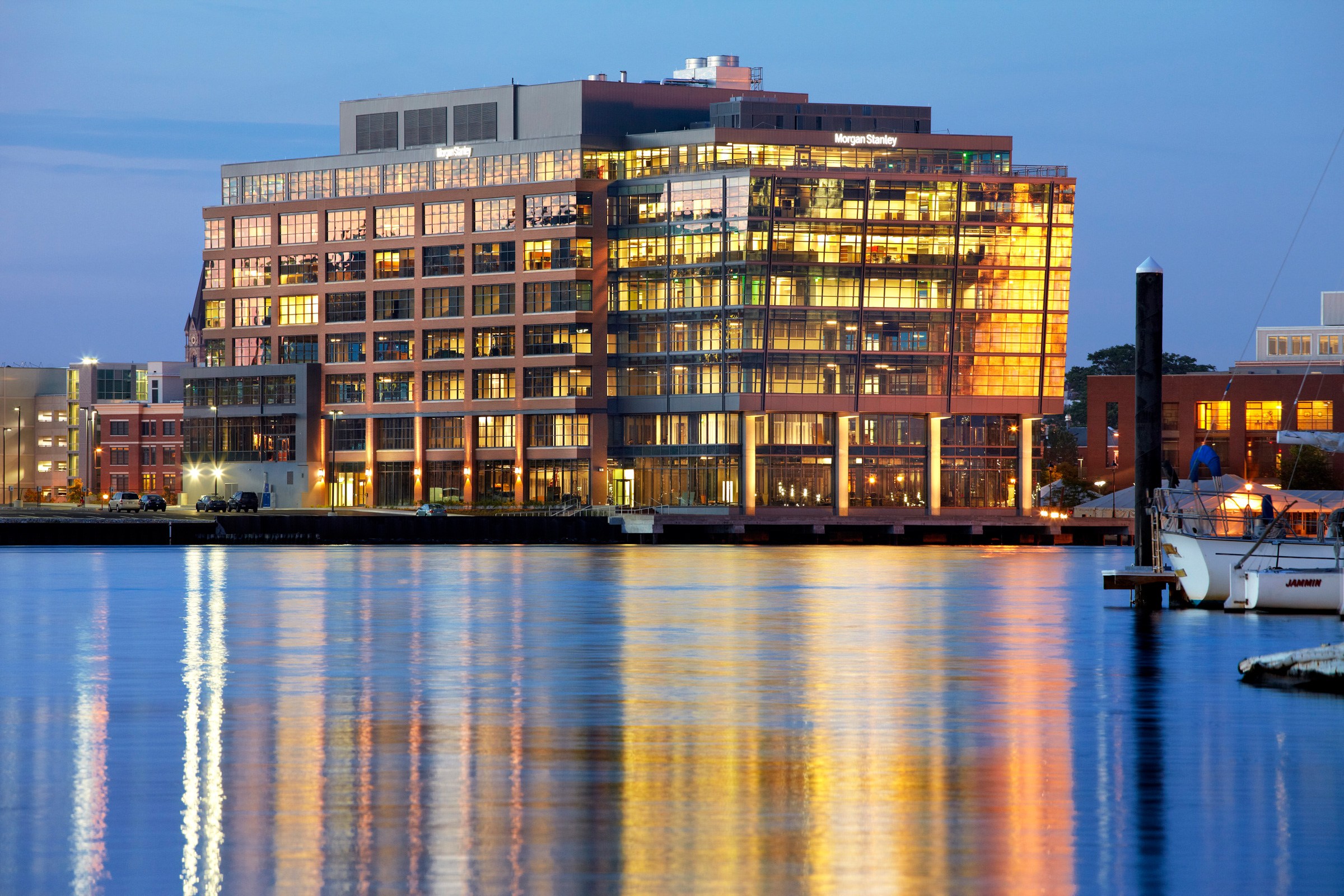 Thames Street Wharf building at dusk on the Inner Harbor