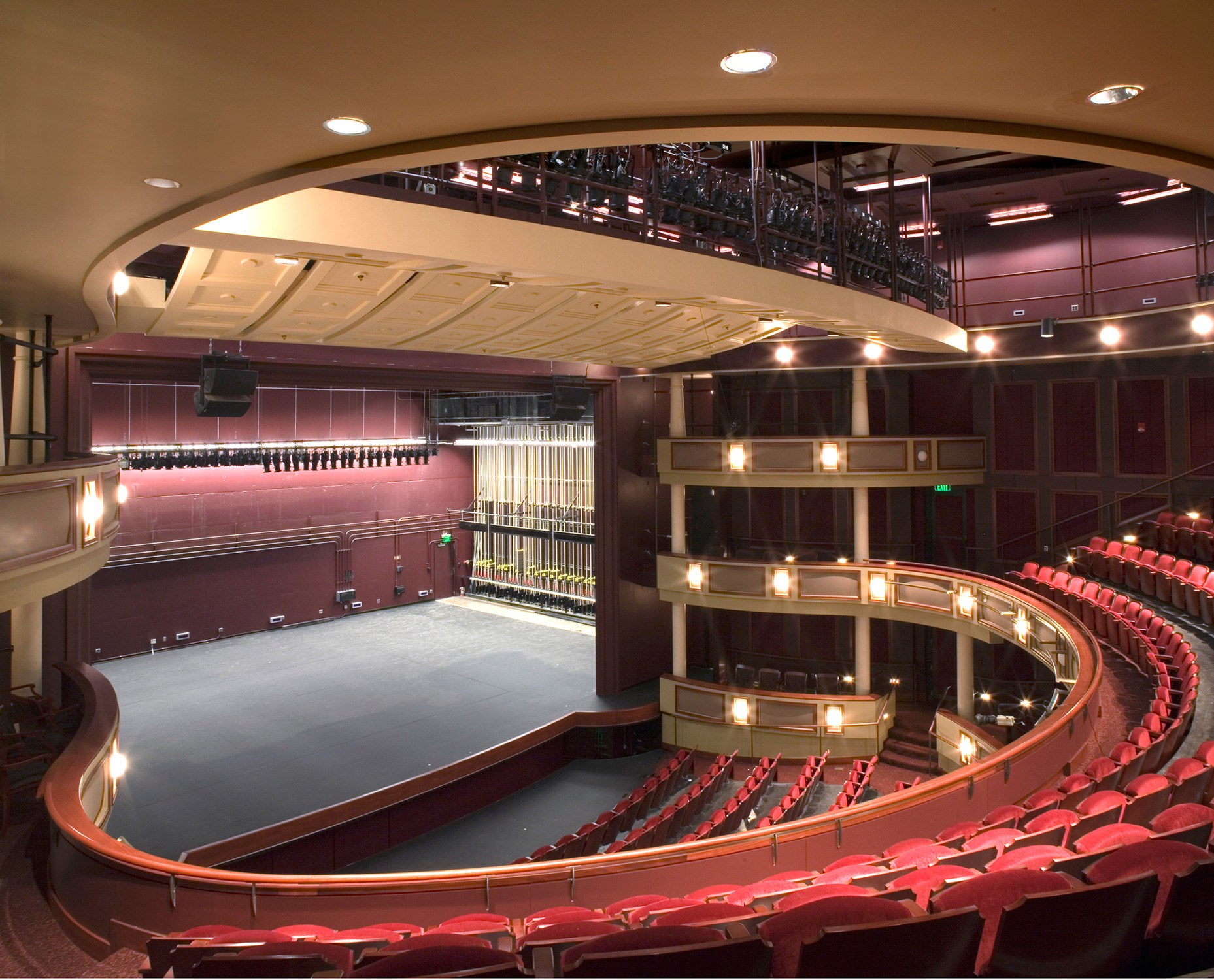 480-seat horseshoe shaped proscenium theater with red velvet seating at the Roselle Center for...