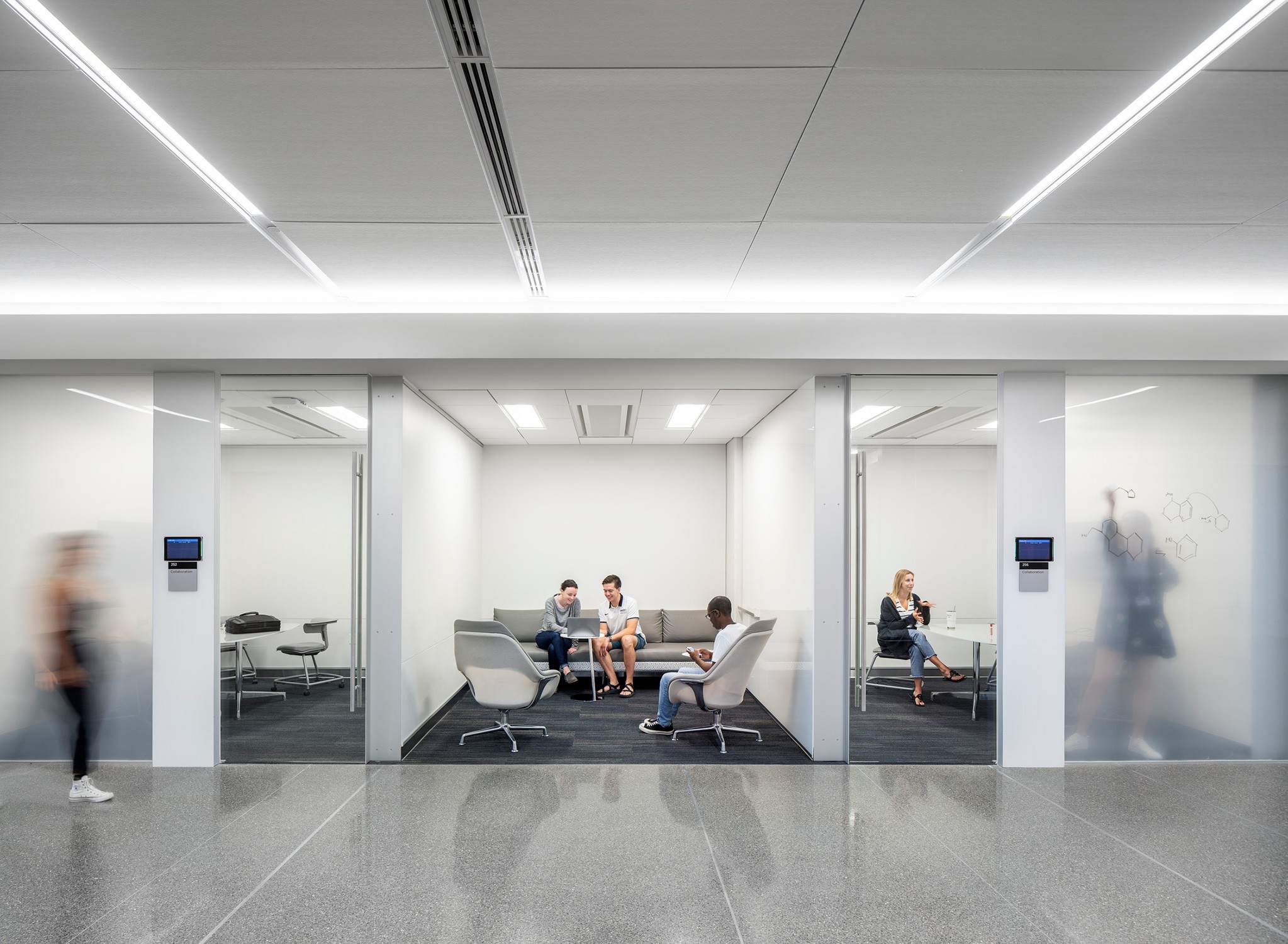 Interior enclosed collaboration space with partitions at University of North Texas Interdisciplinary...