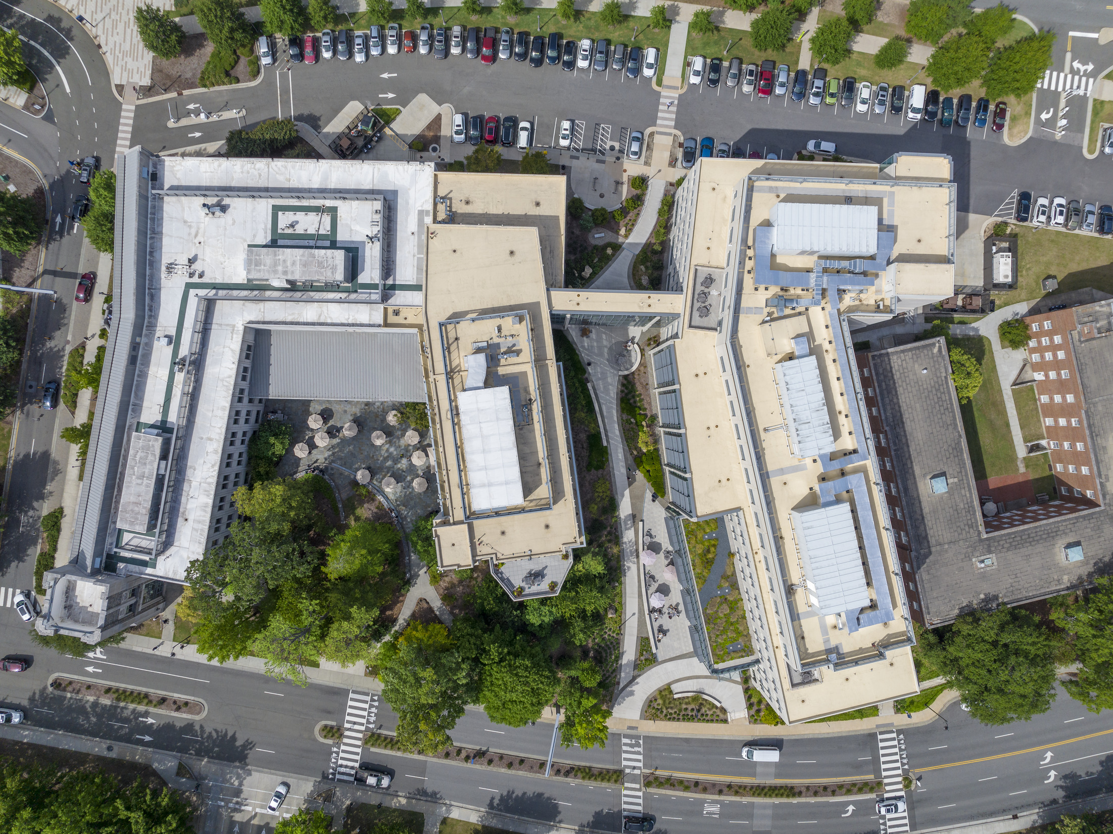 An aerial shot shows all three phases (from left to right) of the Duke School of Nursing and the...