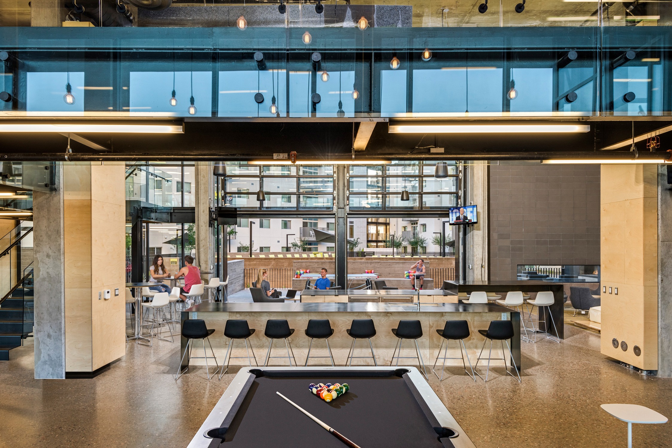 Peak Campus_Vertex Student Housing interior with pool table collaborative space and large windows