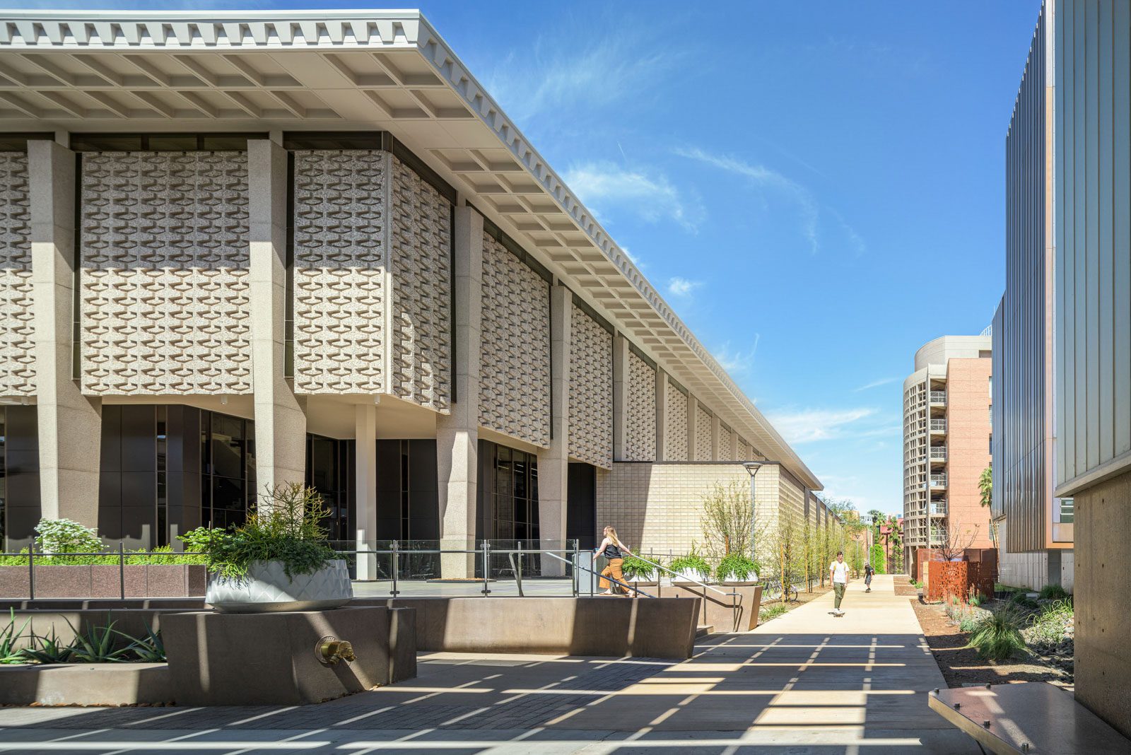 Exterior view of new plaza at the Arizona State University Hayden Library Reinvention with plantings...