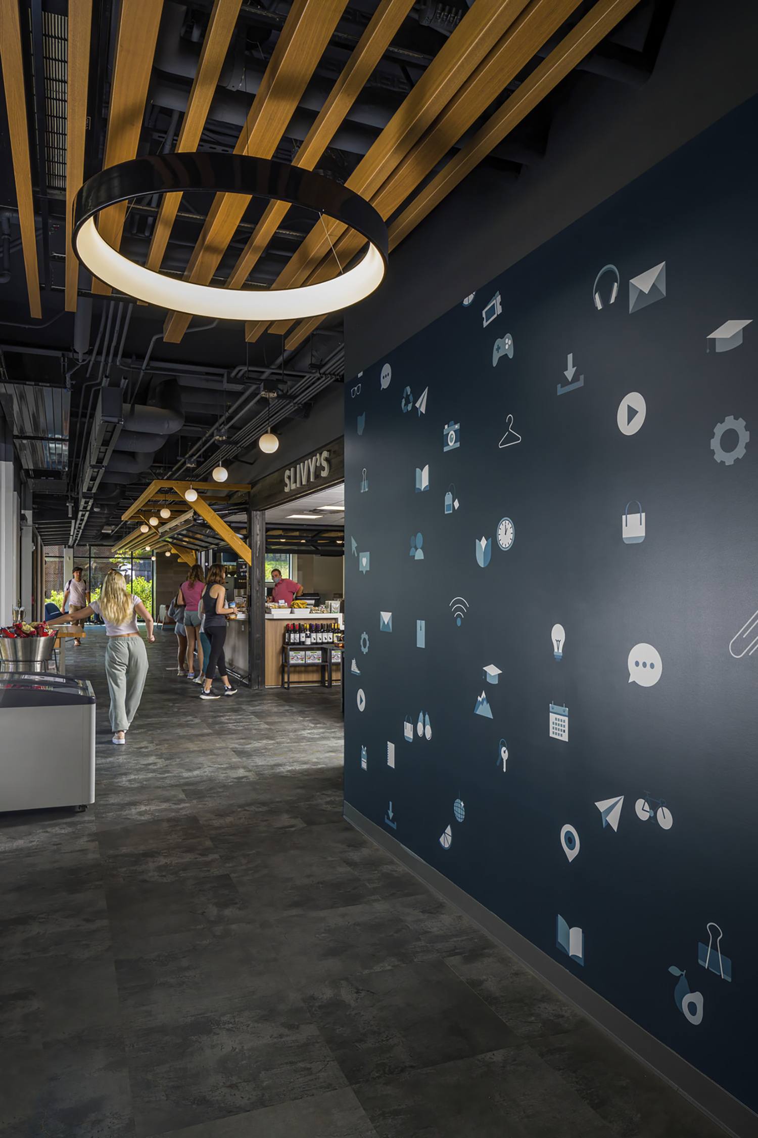 Custom icons fill blank walls at Silverstein Hall at Denison University’s first floor café.