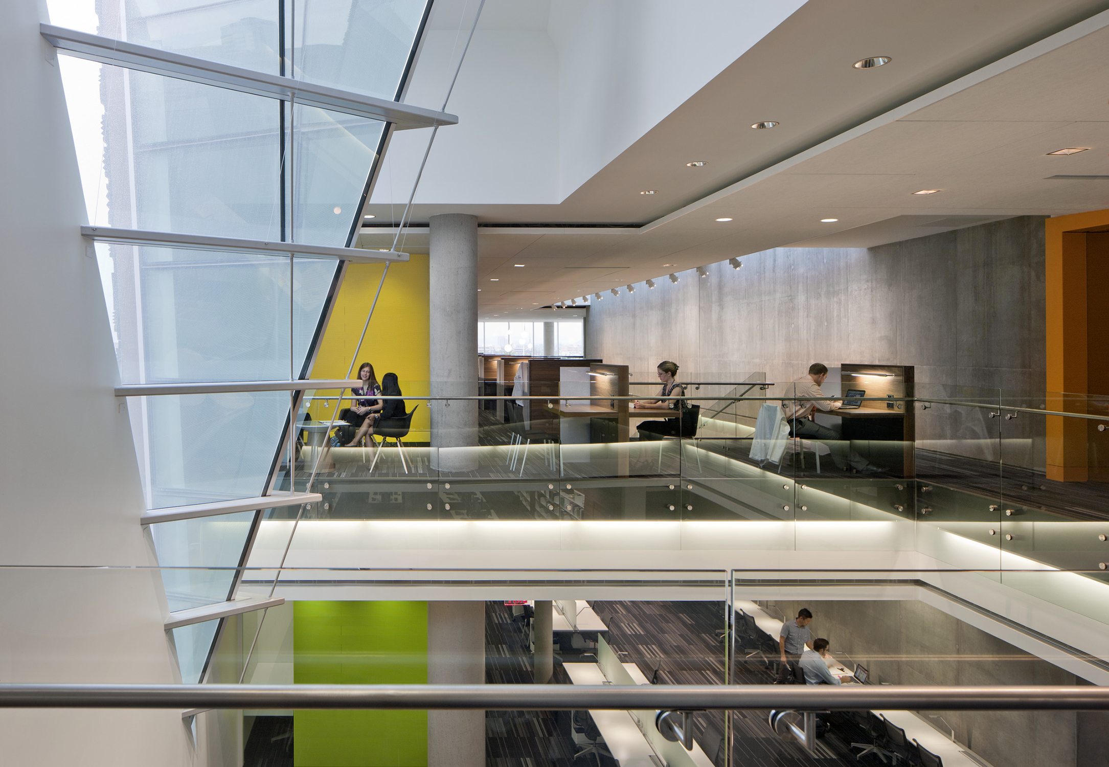 Colorful interior open collaboration space with unique triangle protruding window at the University...