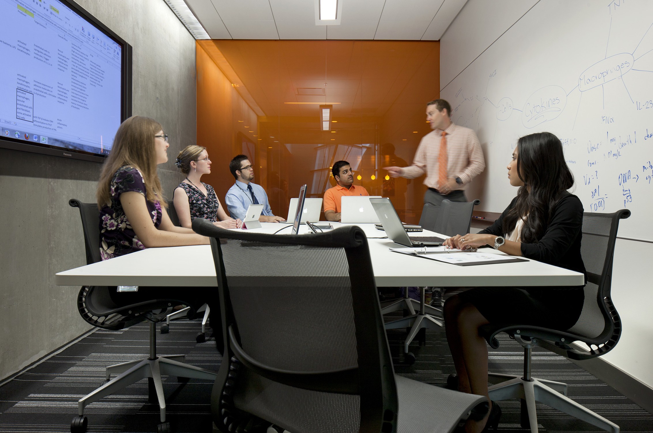 Interior image of a collaboration space with whiteboard walls at the University of Arizona Health...