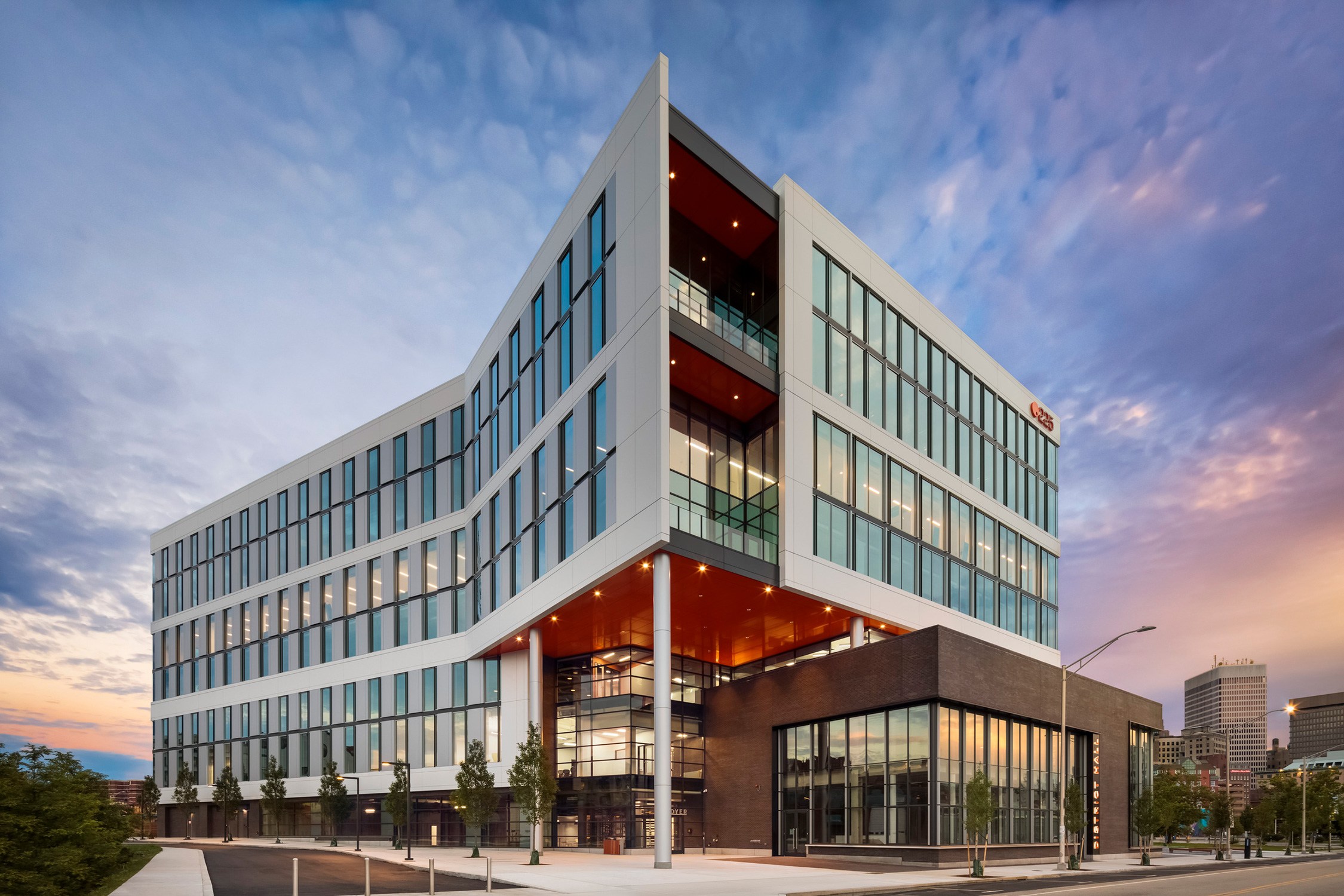 Photograph the exterior of Point225 at the Providence Innovation District at dusk.