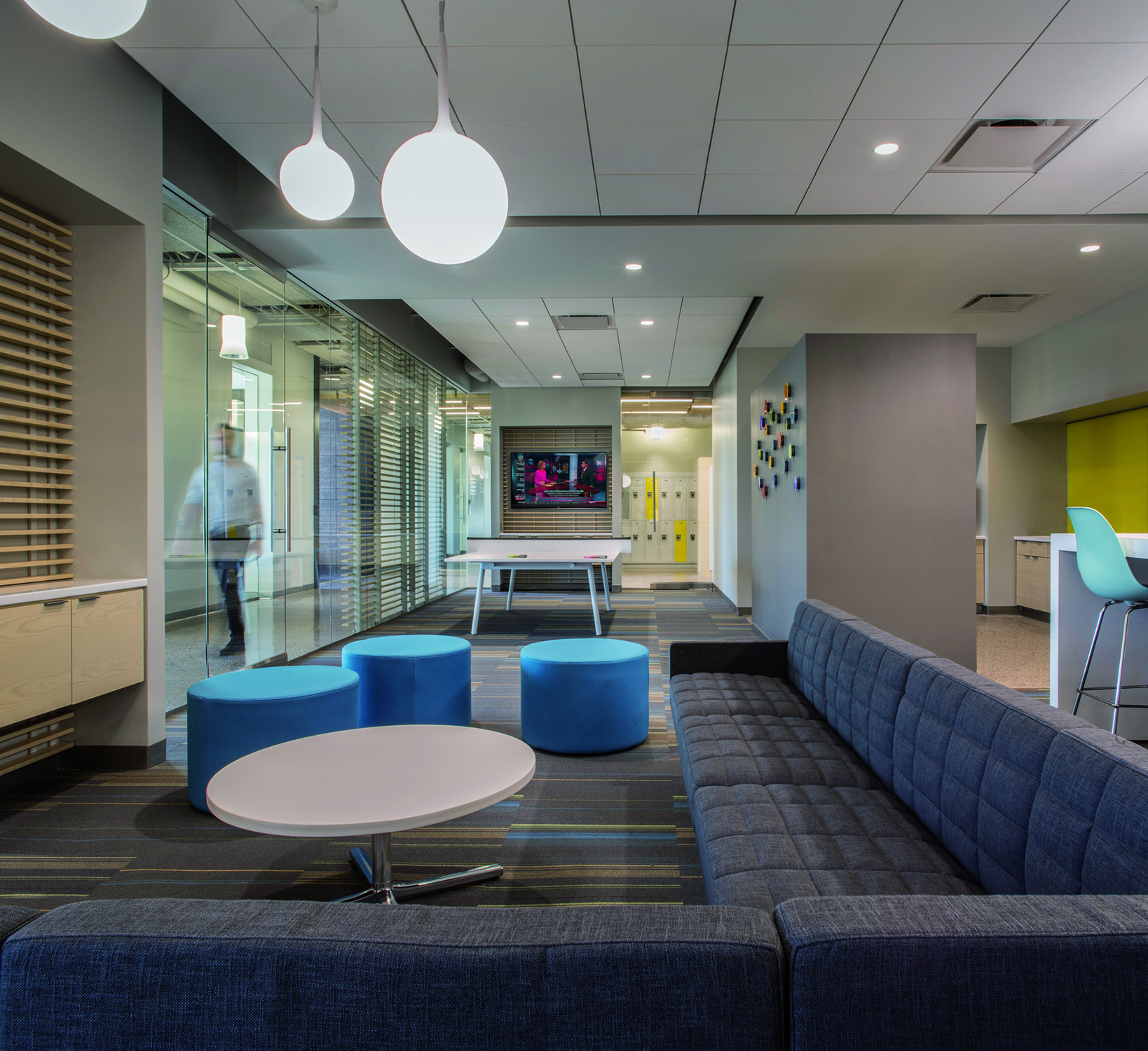 Interior view of social lounge with visual connections to central spine and student support programs...