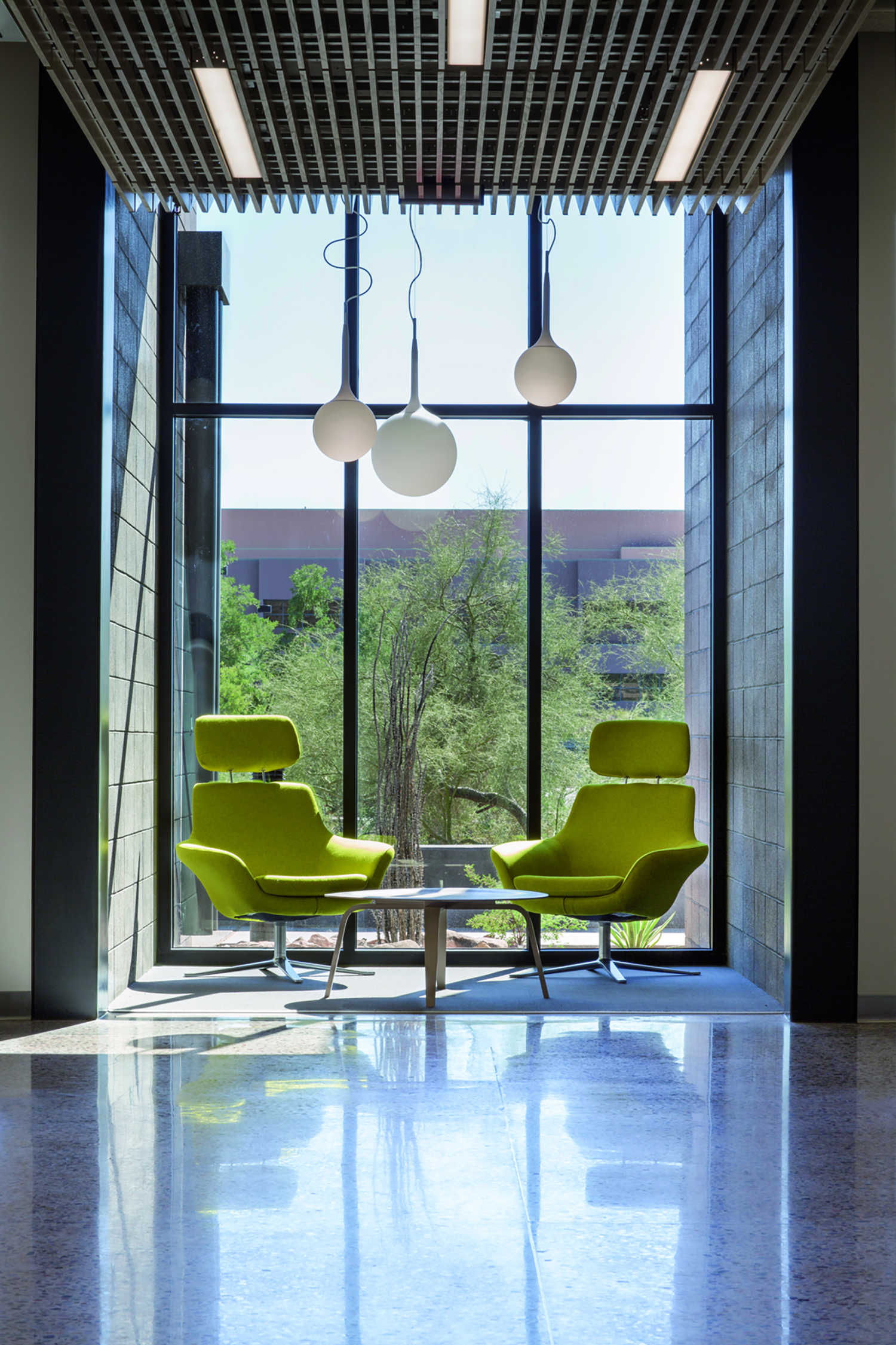 Interior view of study alcove with views extending to the outdoor landscape at Mayo Clinic Alix...