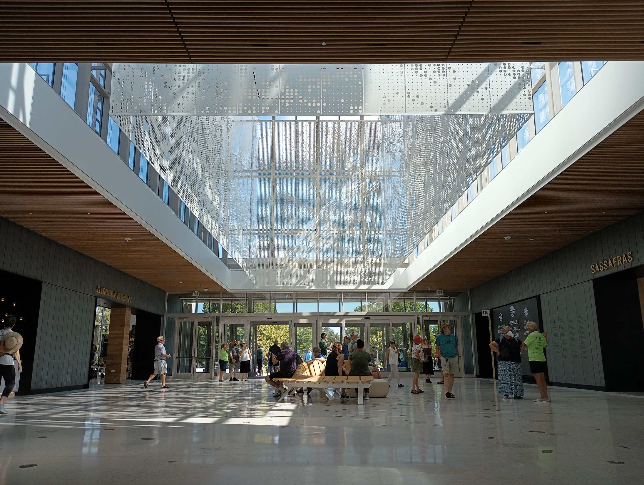 A photo shows dappled light being filtered through the scrim lantern at the Jack C. Taylor Visitor...