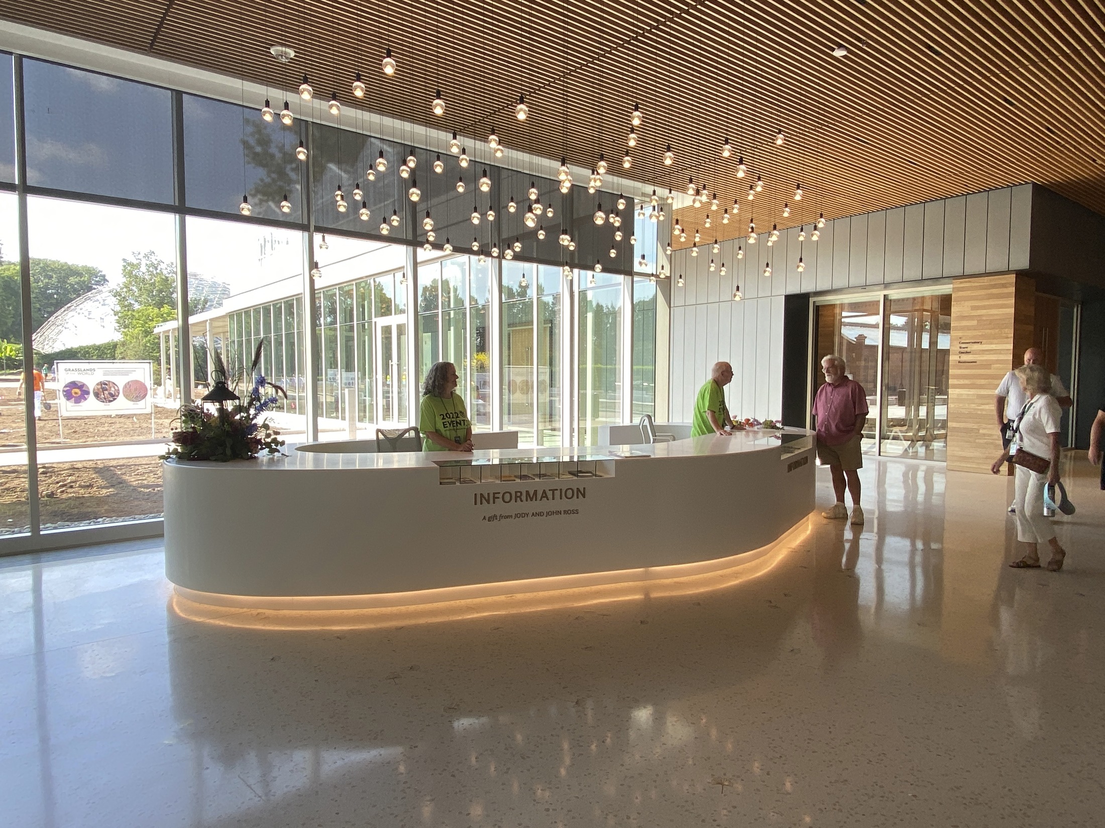 An information desk at the Jack C. Taylor Visitor Center is inspired by the shape of a river rock,...