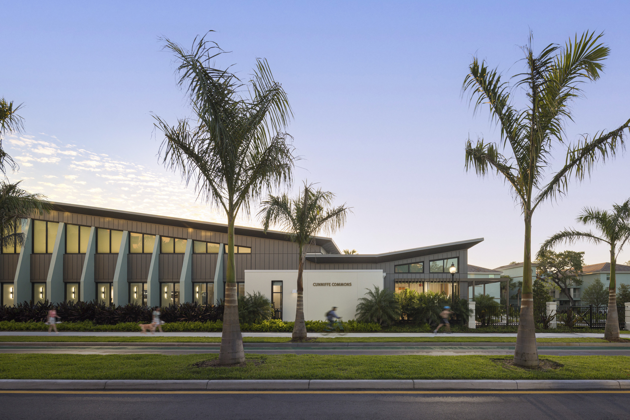 an exterior image of Ringling's Cunniffe Commons at dusk