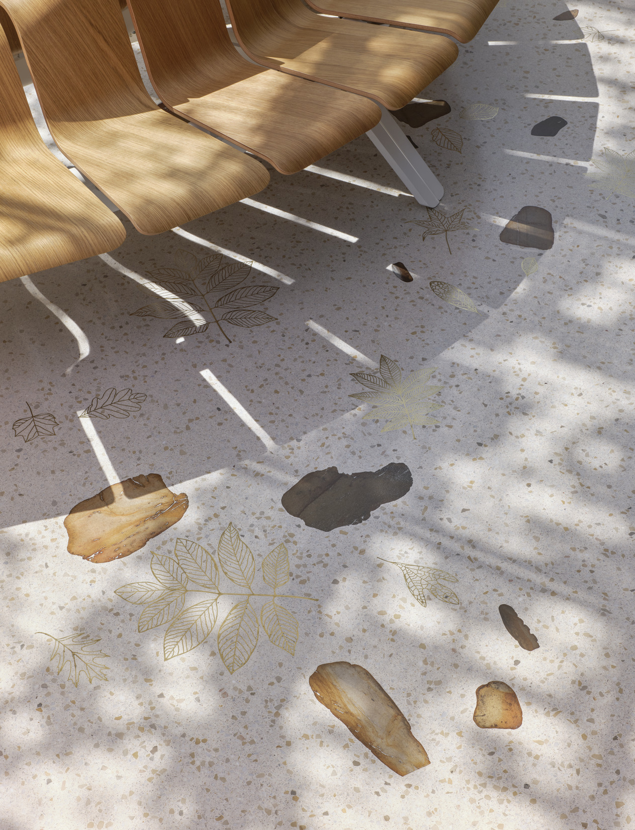 Lobby flooring at the Jack C. Taylor Visitor Center includes hand-lain terrazzo with local river...