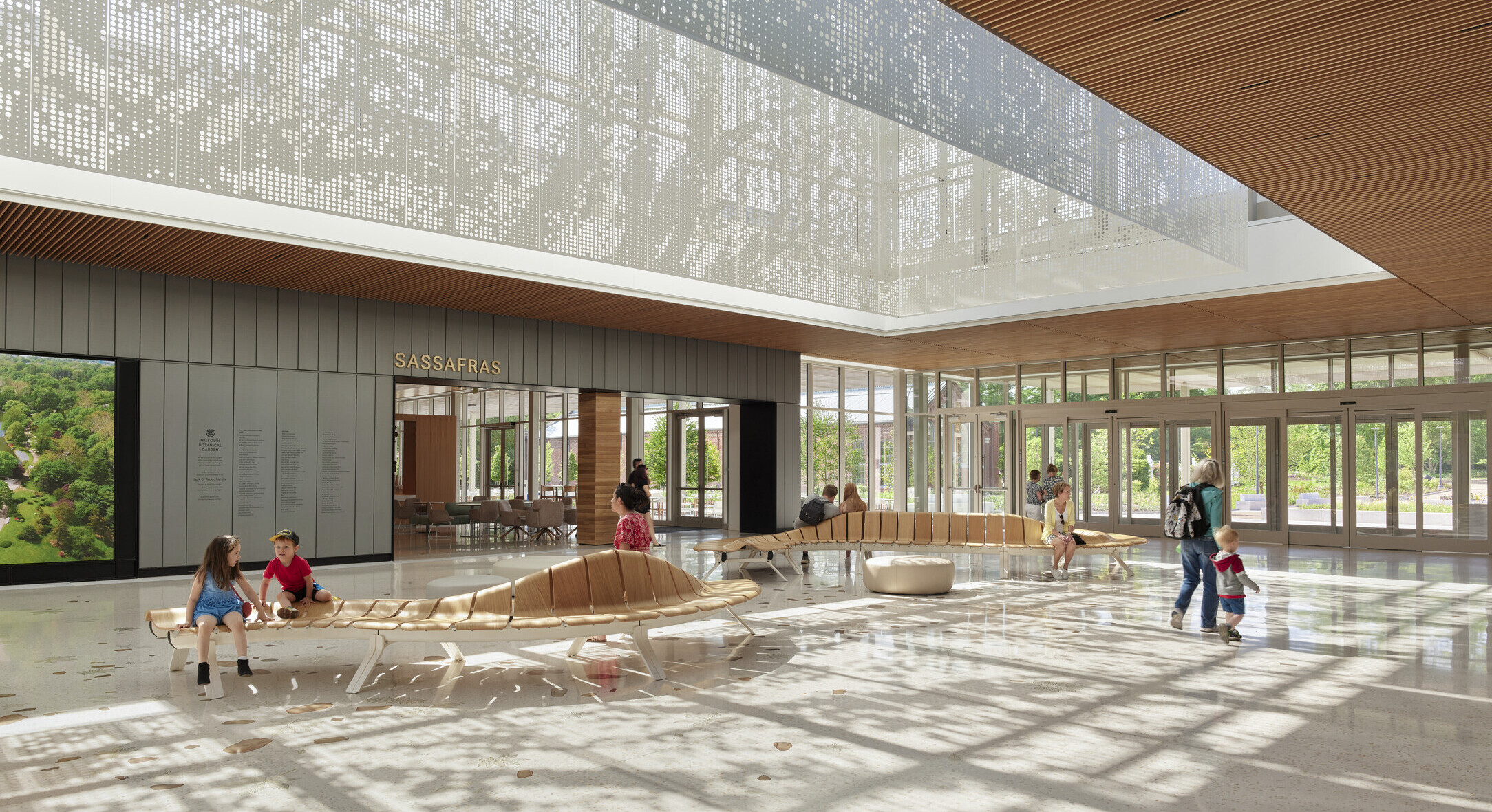 Dappled sunlight shines through the lobby lantern at the Jack C. Taylor Visitor Center
