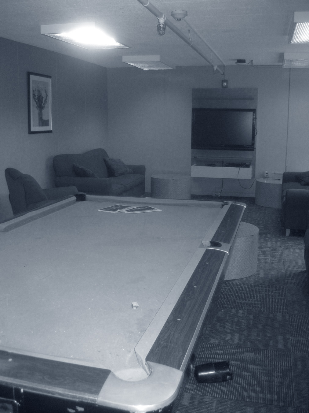 Before: A dimly lit student lounge