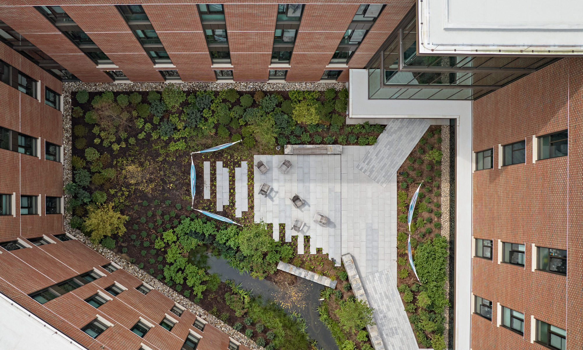 An aerial view of The Grove at Quinnipiac University, showcasing a landscaped plaza