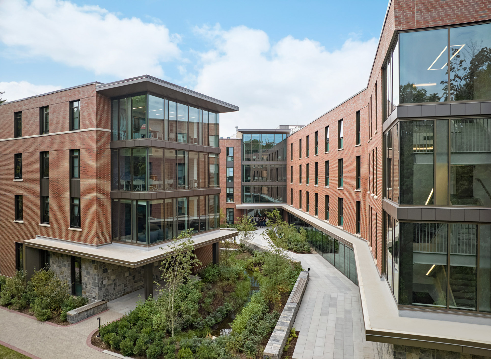 An aerial view of The Grove at Quinnipiac University, showcasing a landscaped plaza