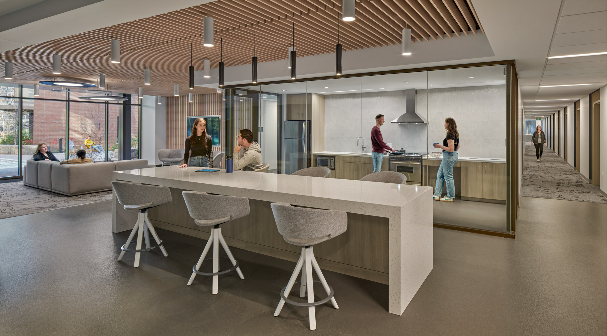 A student space within The Grove features a communal study area and kitchen.