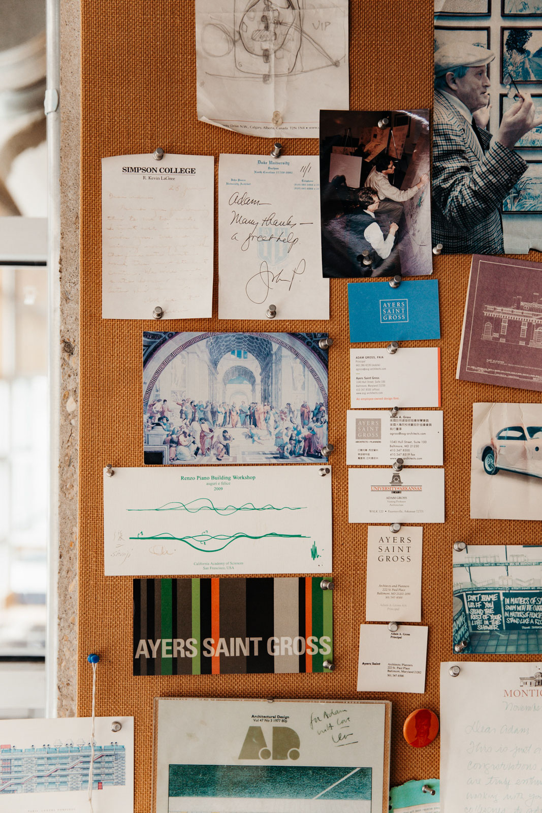 A close-up of some of the inspirational images from Adam Gross's desk