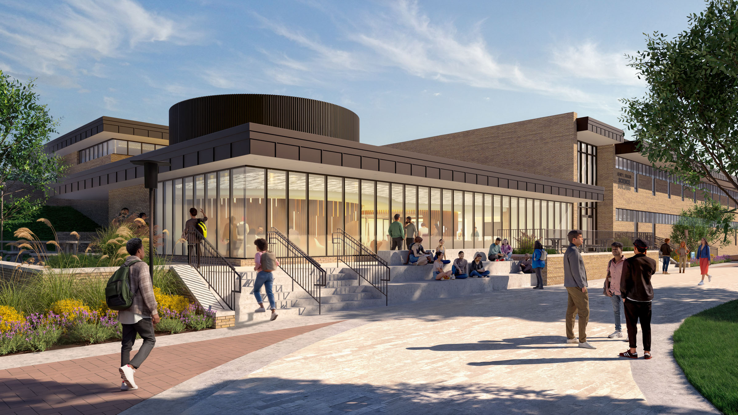 Daytime view of the Dragun building at Anne Arundel Community College featuring a glass-fronted...