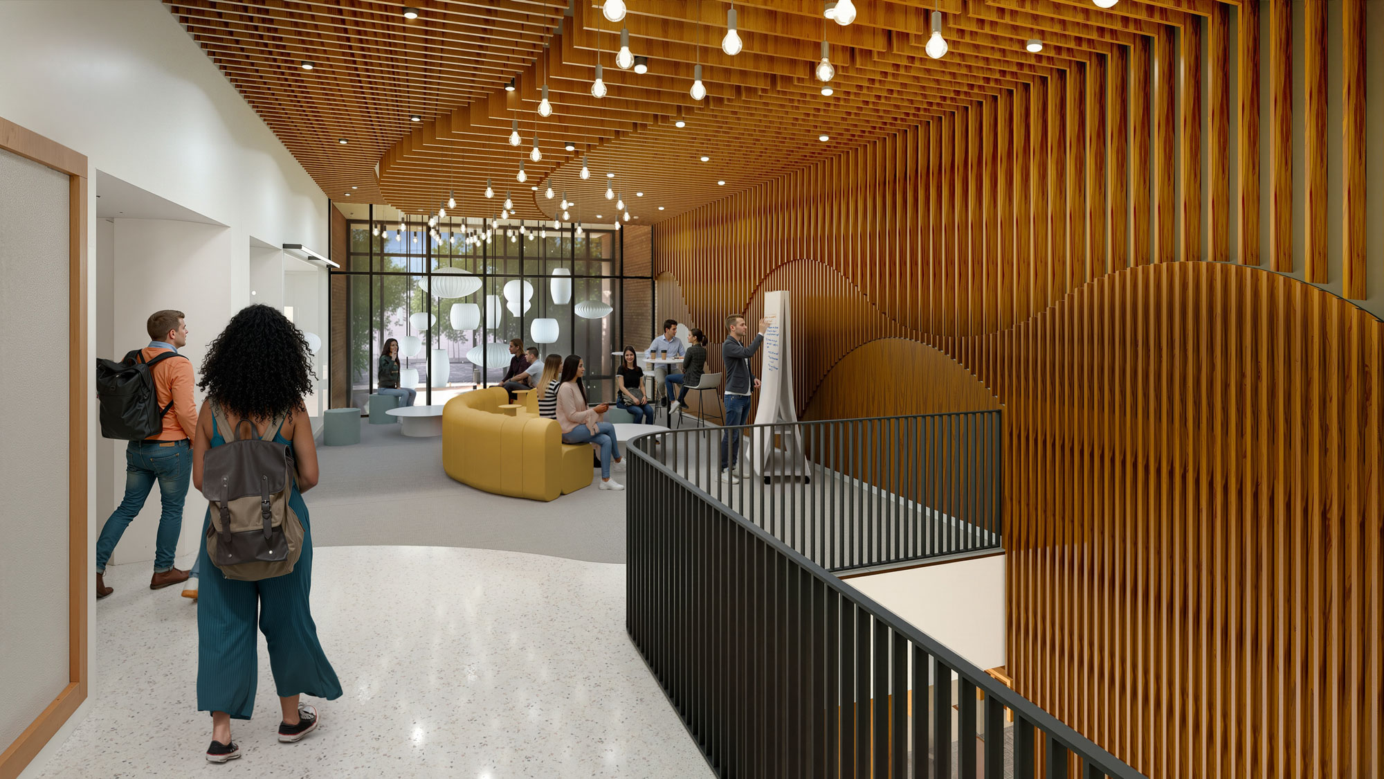 Interior passage with wood slat feature wall, informal seating areas, and students walking through...